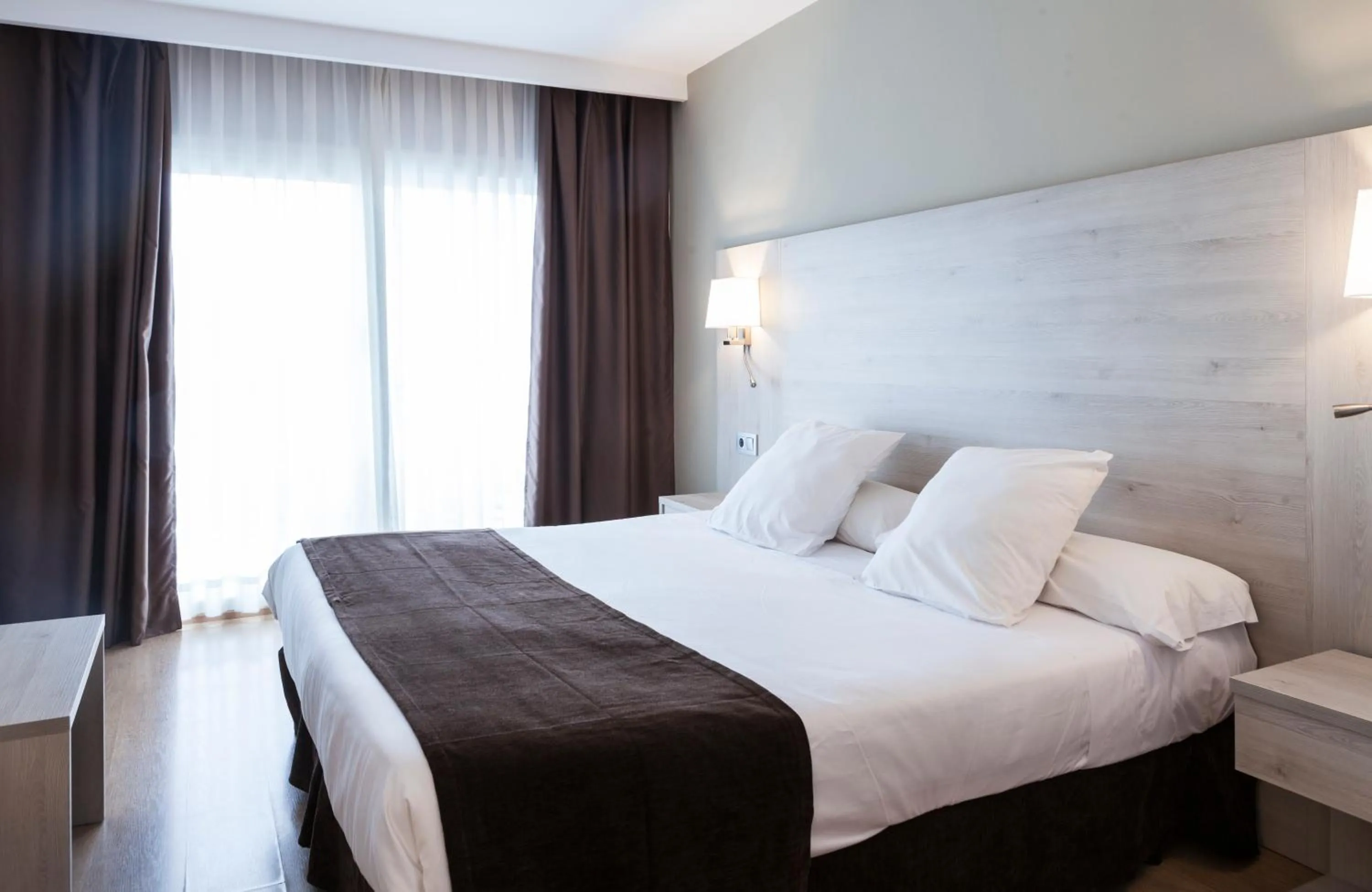 Bed in Hotel Helios Lloret