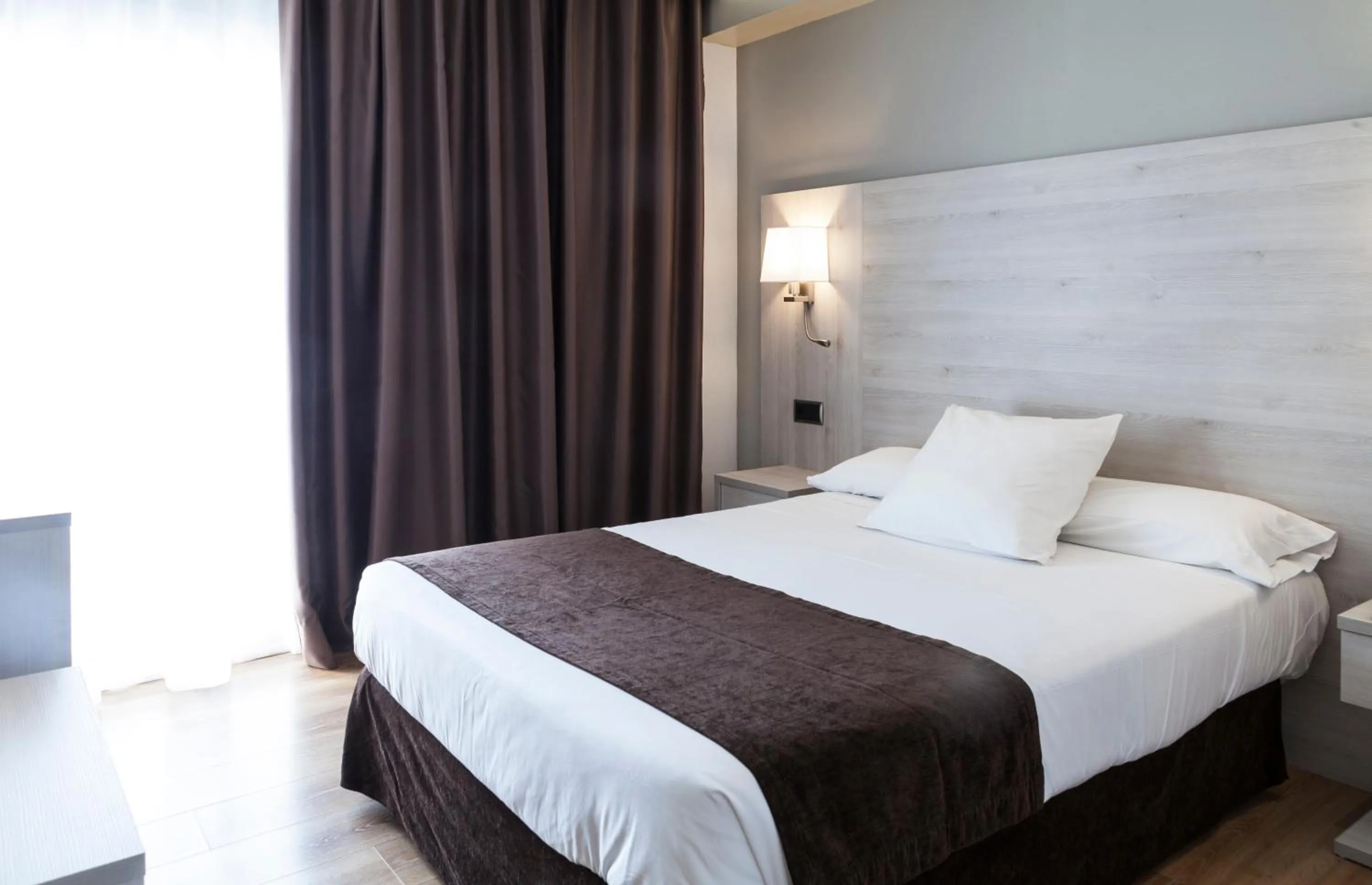 Bed in Hotel Helios Lloret