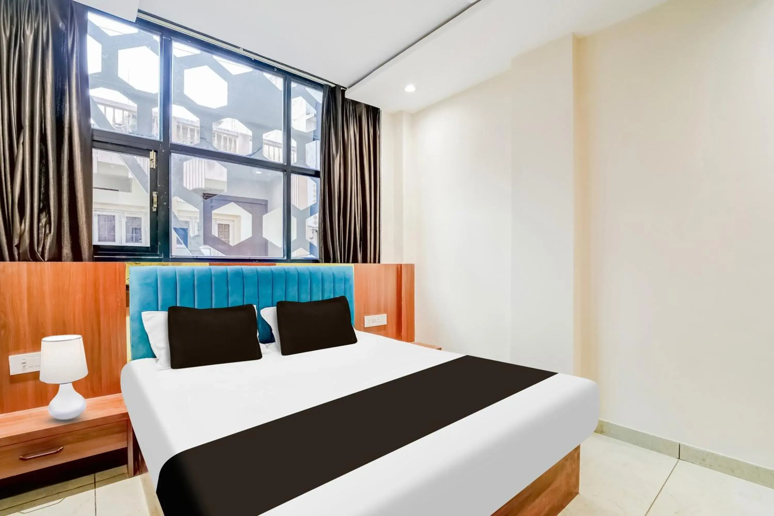 Triple Room with Bath - single occupancy in Hotel O Mahakal Temple Formerly Shivangam Triple Room with Bath - single occupancy in Hotel O Mahakal Temple Formerly Shivangam