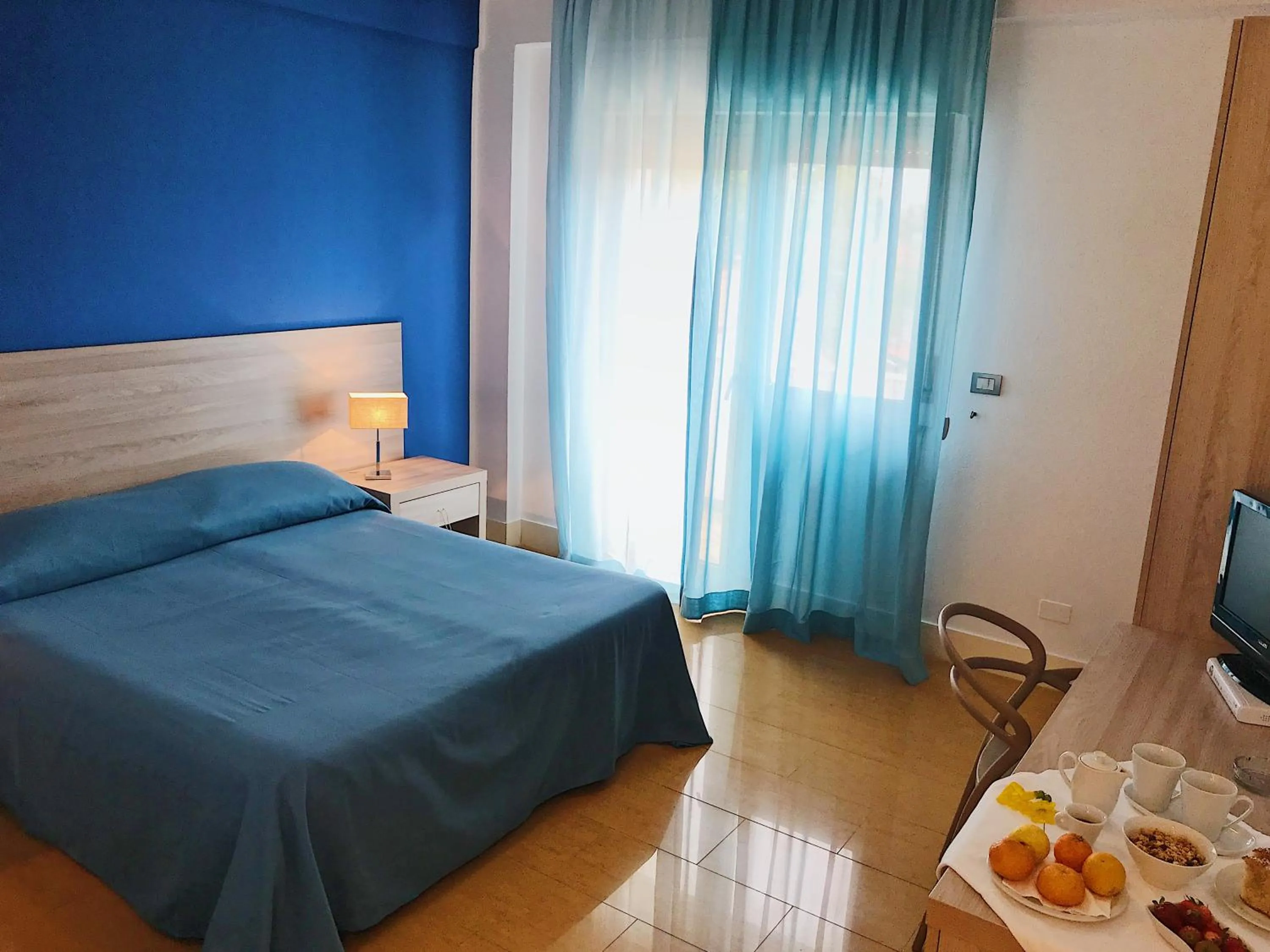 Bed in Hotel Conchiglia d'Oro