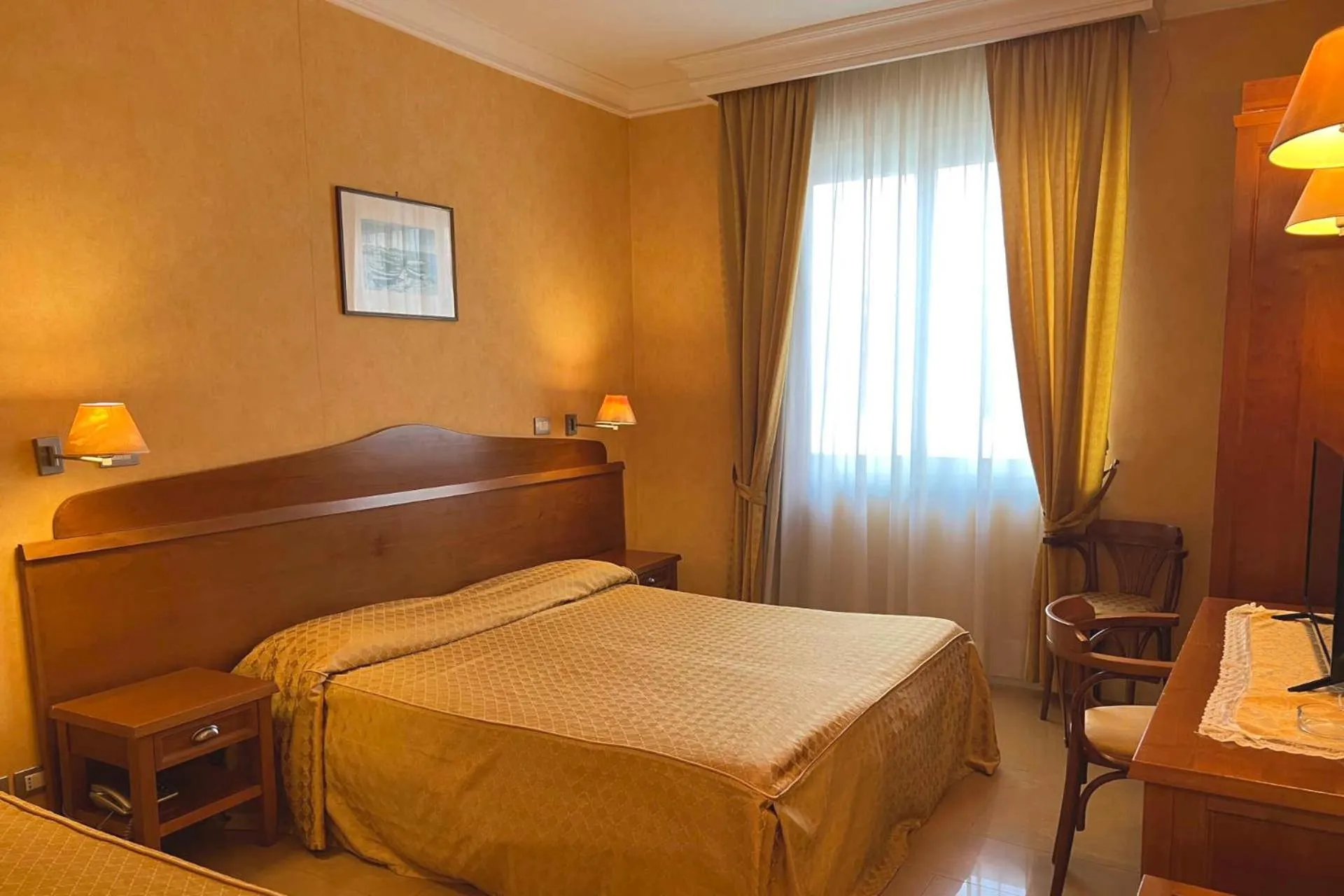 Bed in Hotel Conchiglia d'Oro