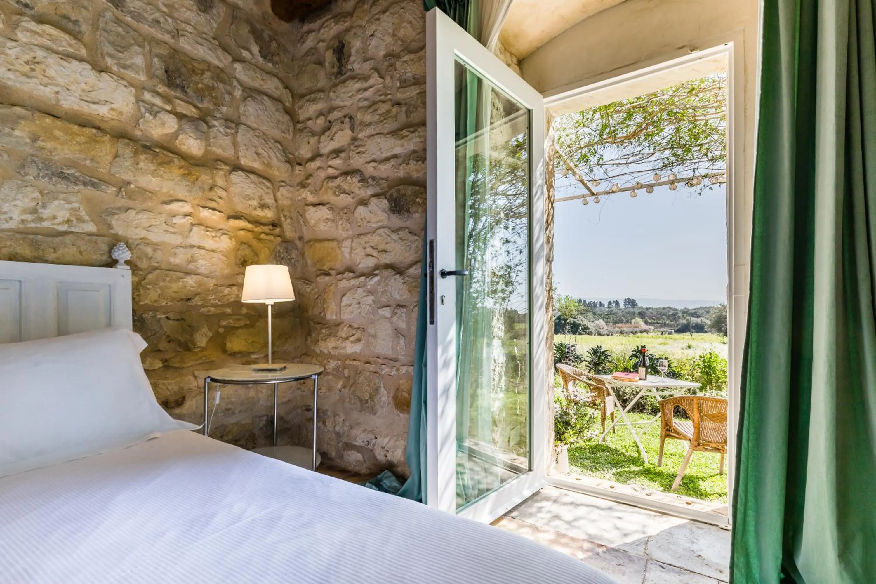 Landmark view, Bed in Baglio Occhipinti