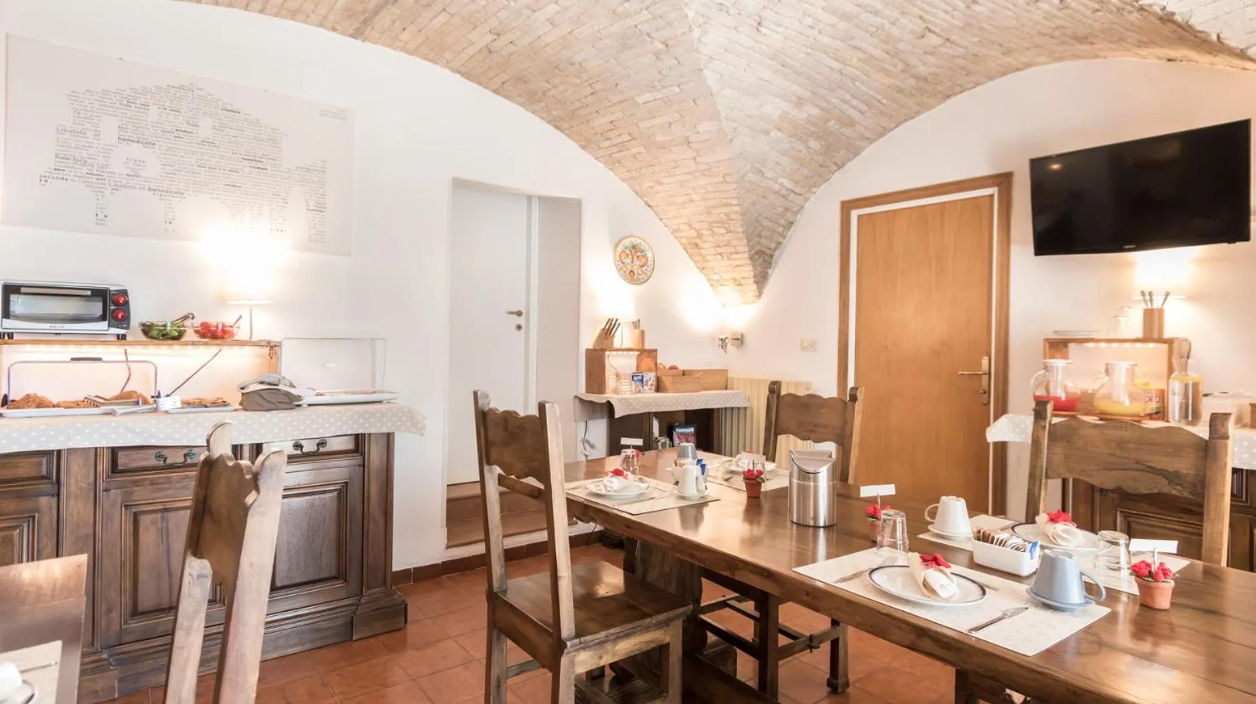 Communal lounge/ TV room in B&B Cantico Delle Creature