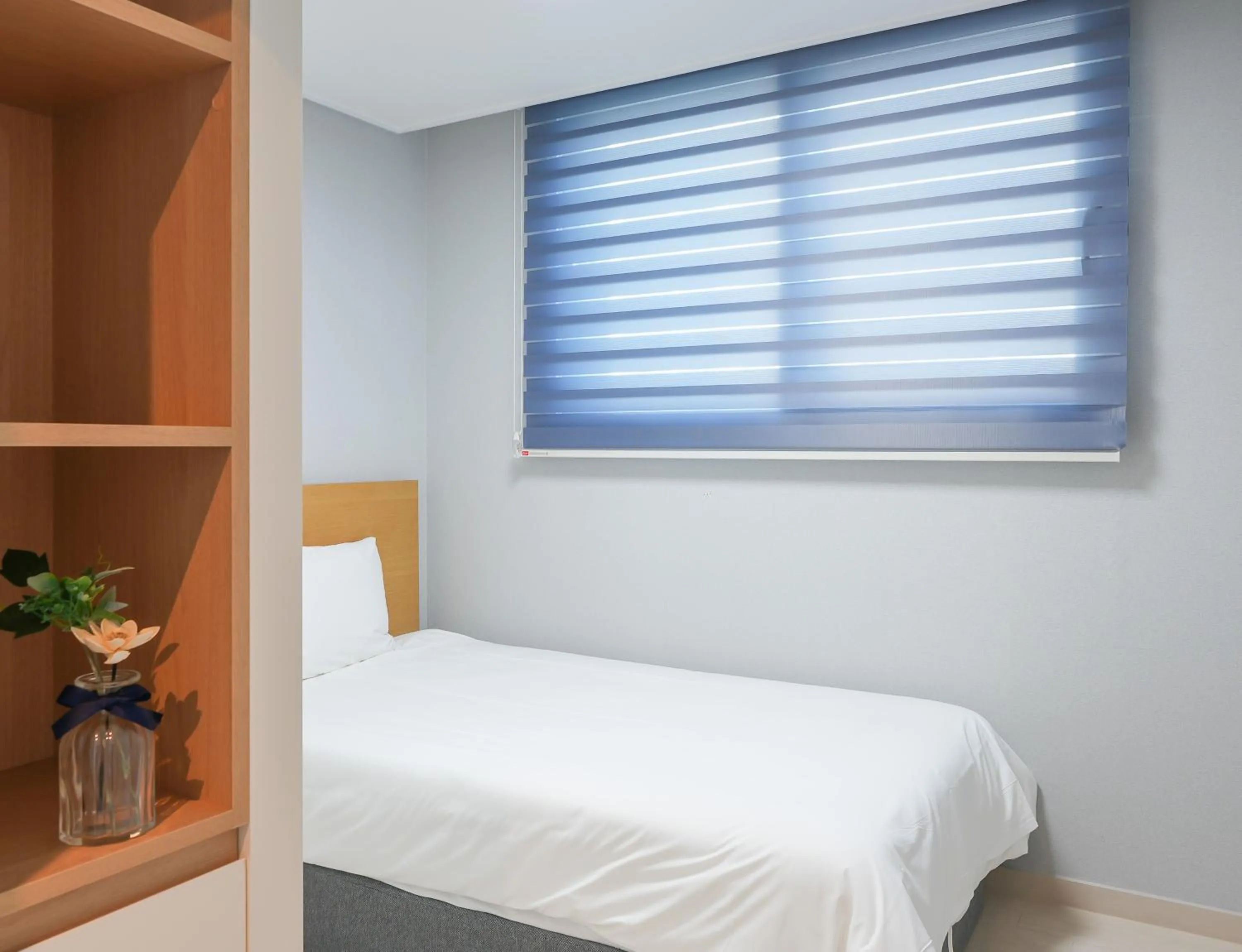 Bed in Firstcity Hotel YEOSU