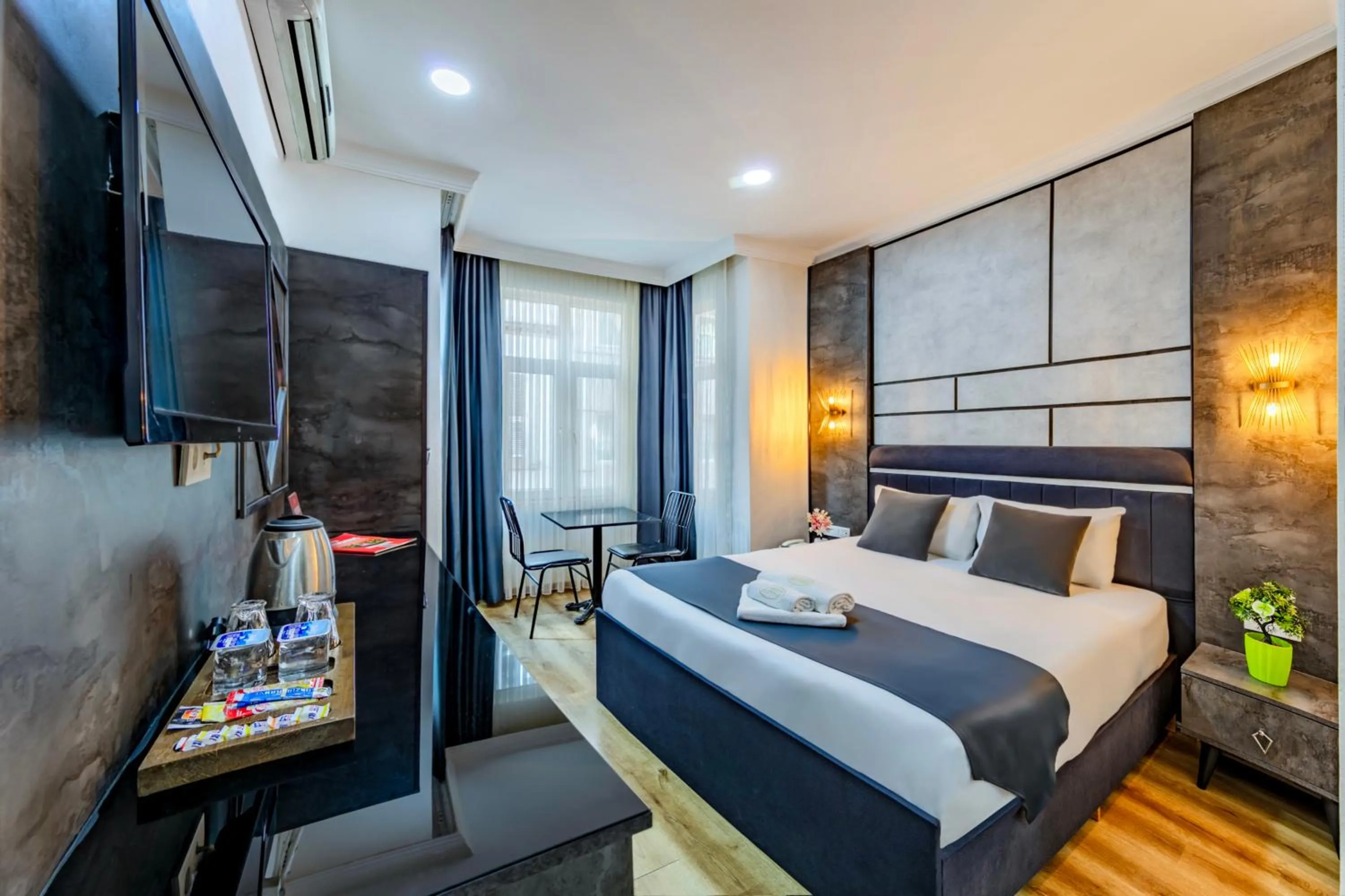 Bed in La Pazza Suites