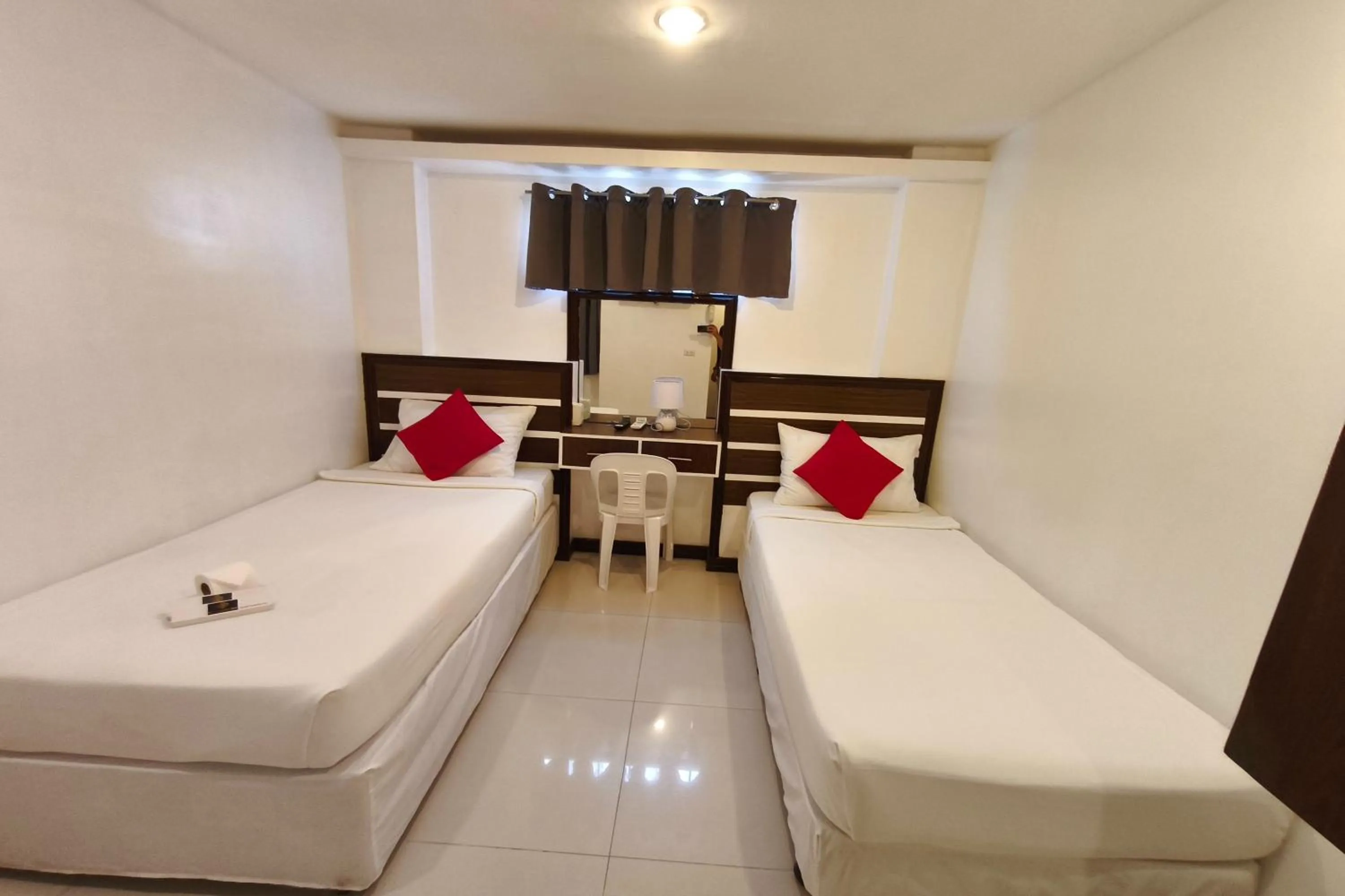 Photo of the whole room, Bed in Ecoland 88 Apartelle and Suite near SM Davao