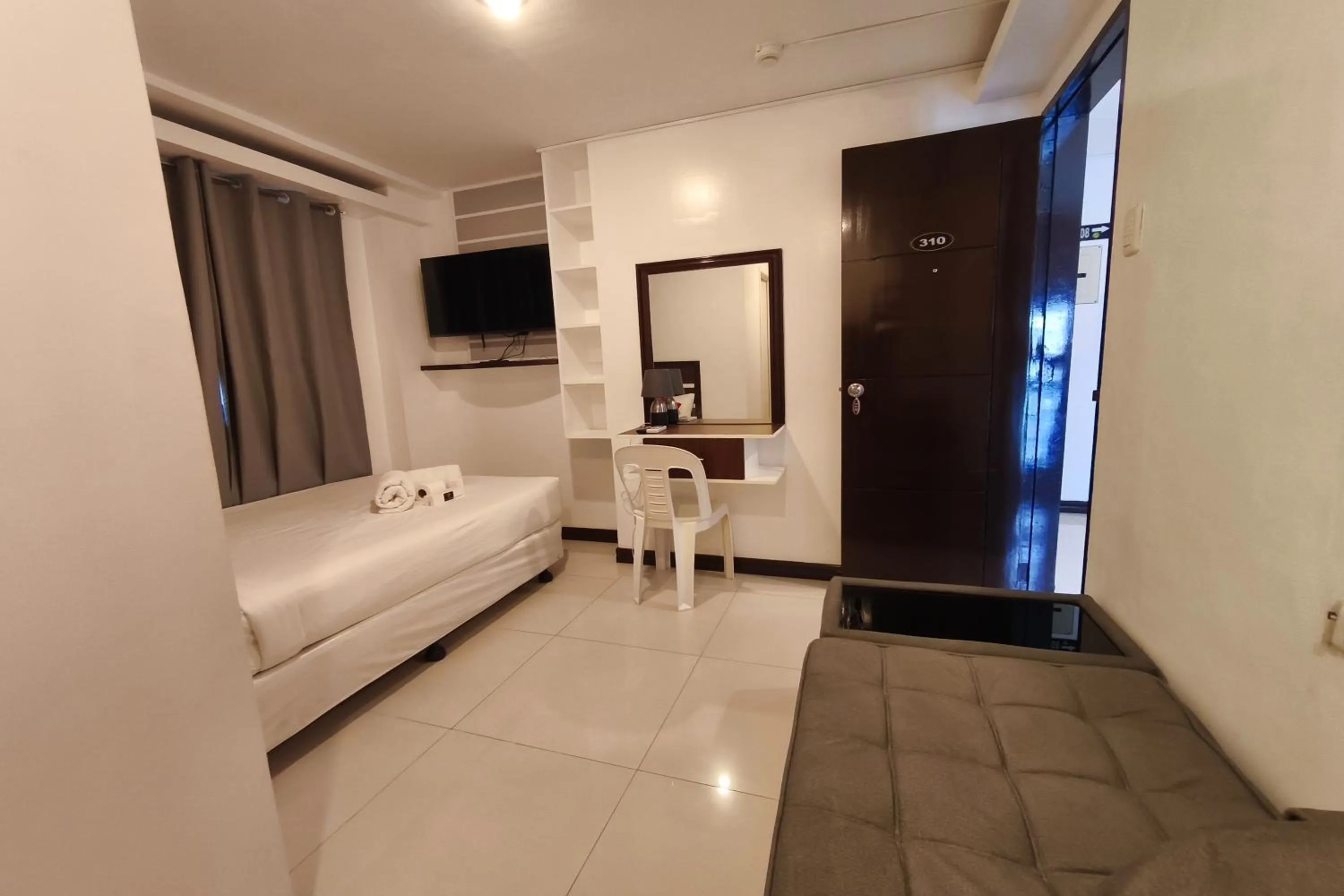 Photo of the whole room, Bed in Ecoland 88 Apartelle and Suite near SM Davao