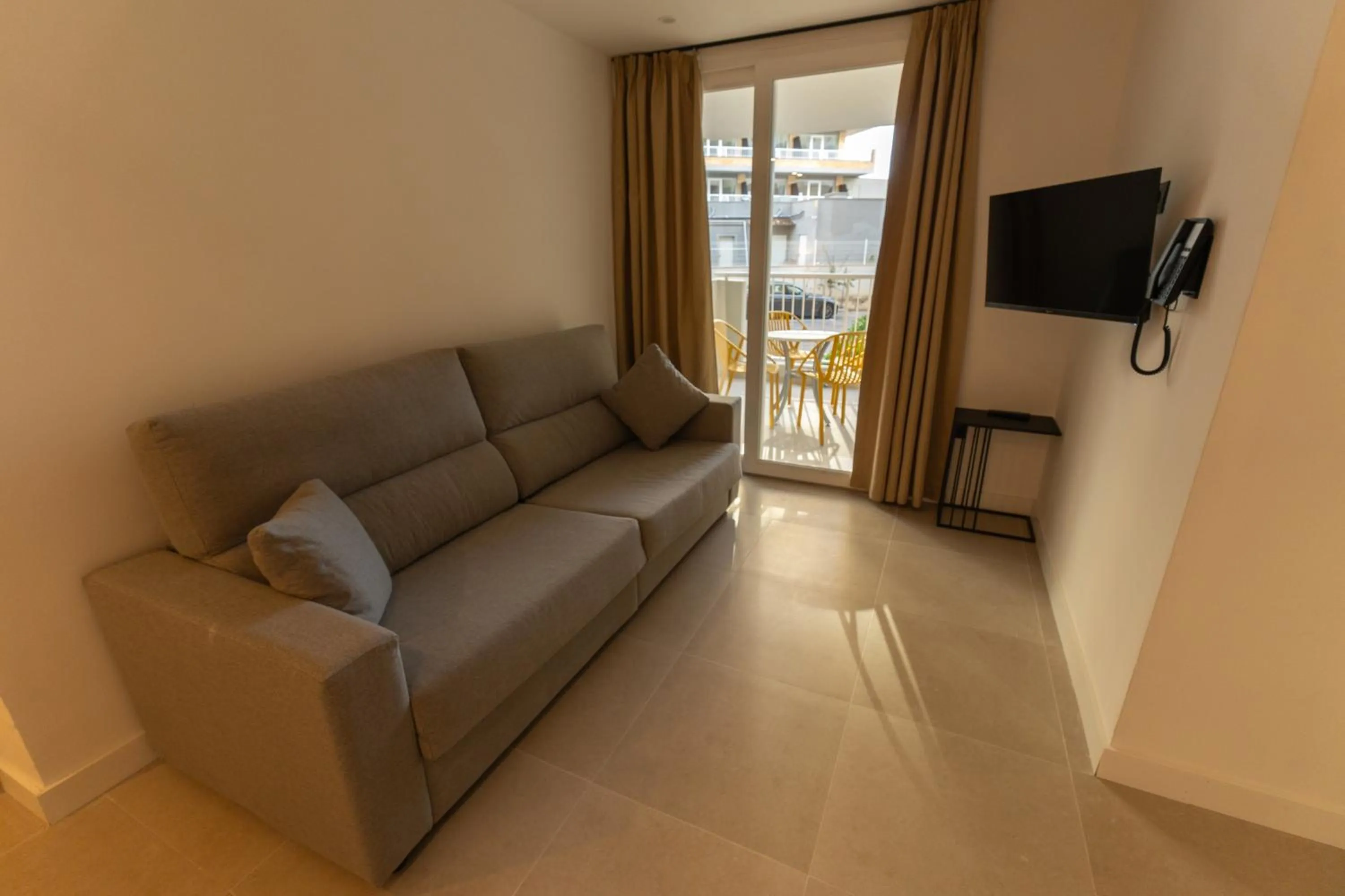 Communal lounge/ TV room in Apartamentos Vistasol