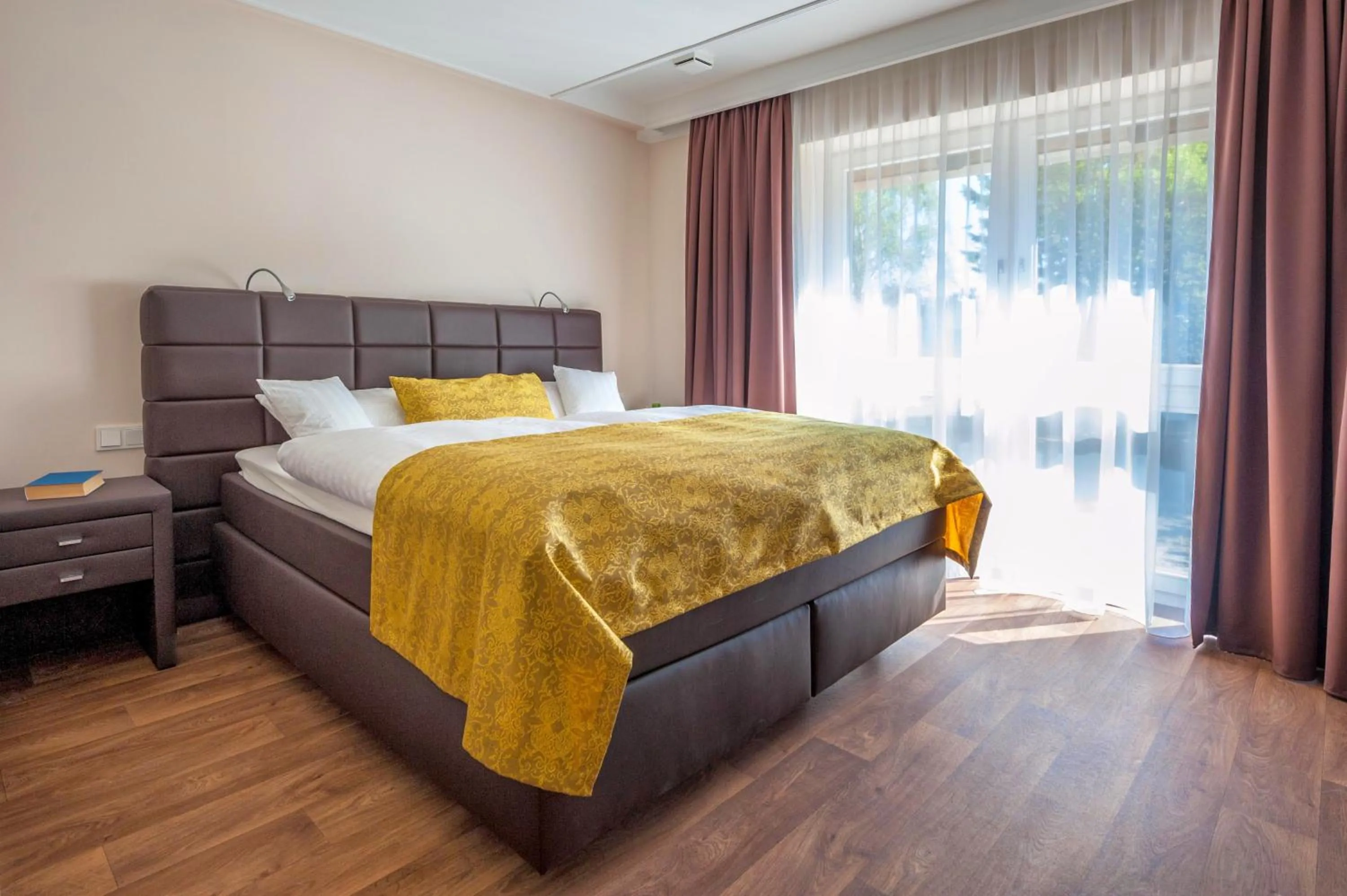 Photo of the whole room, Bed in Die Edelkastanie