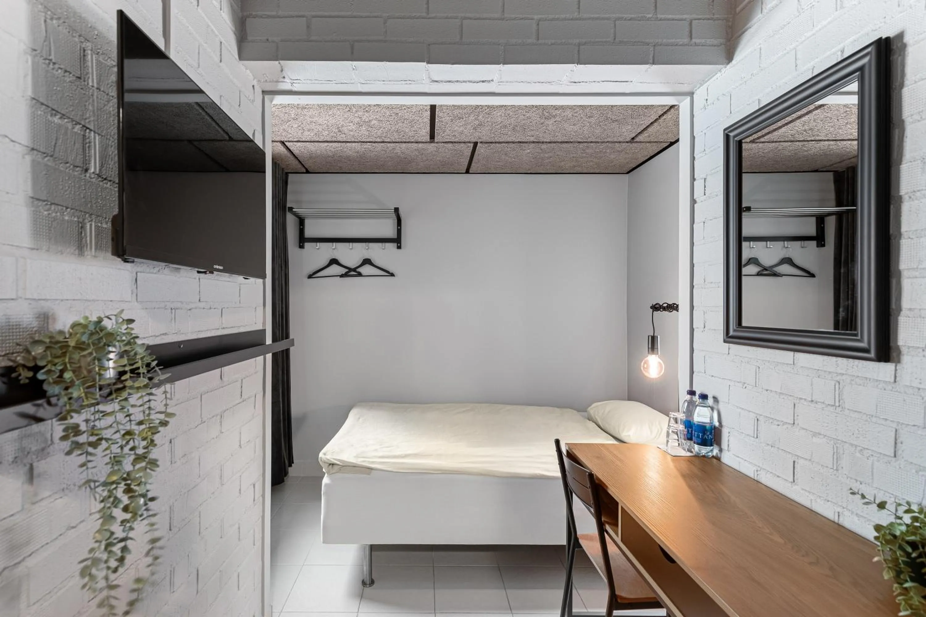 Bed in Kallhällsbaden Strandhotell