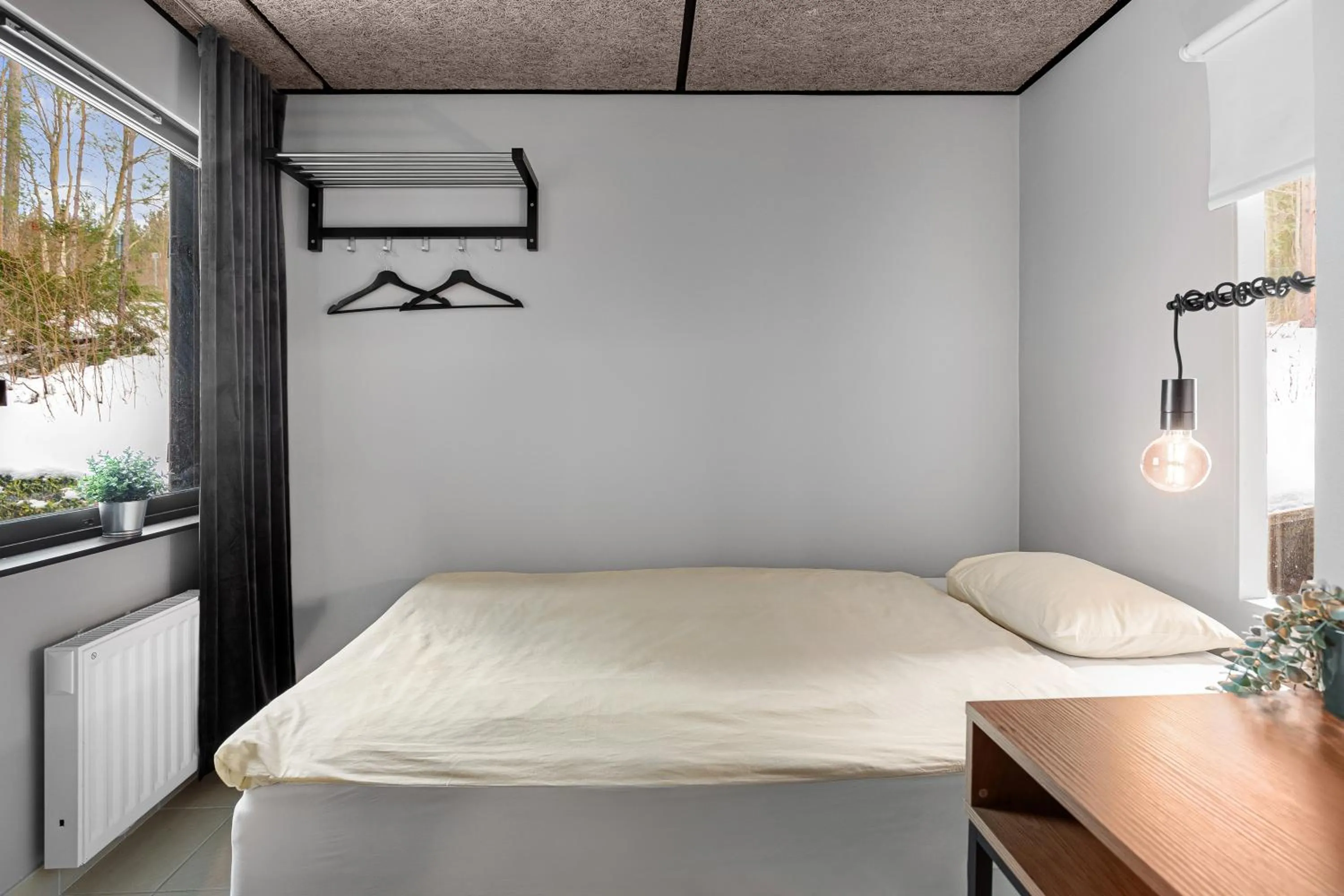 Bed in Kallhällsbaden Strandhotell