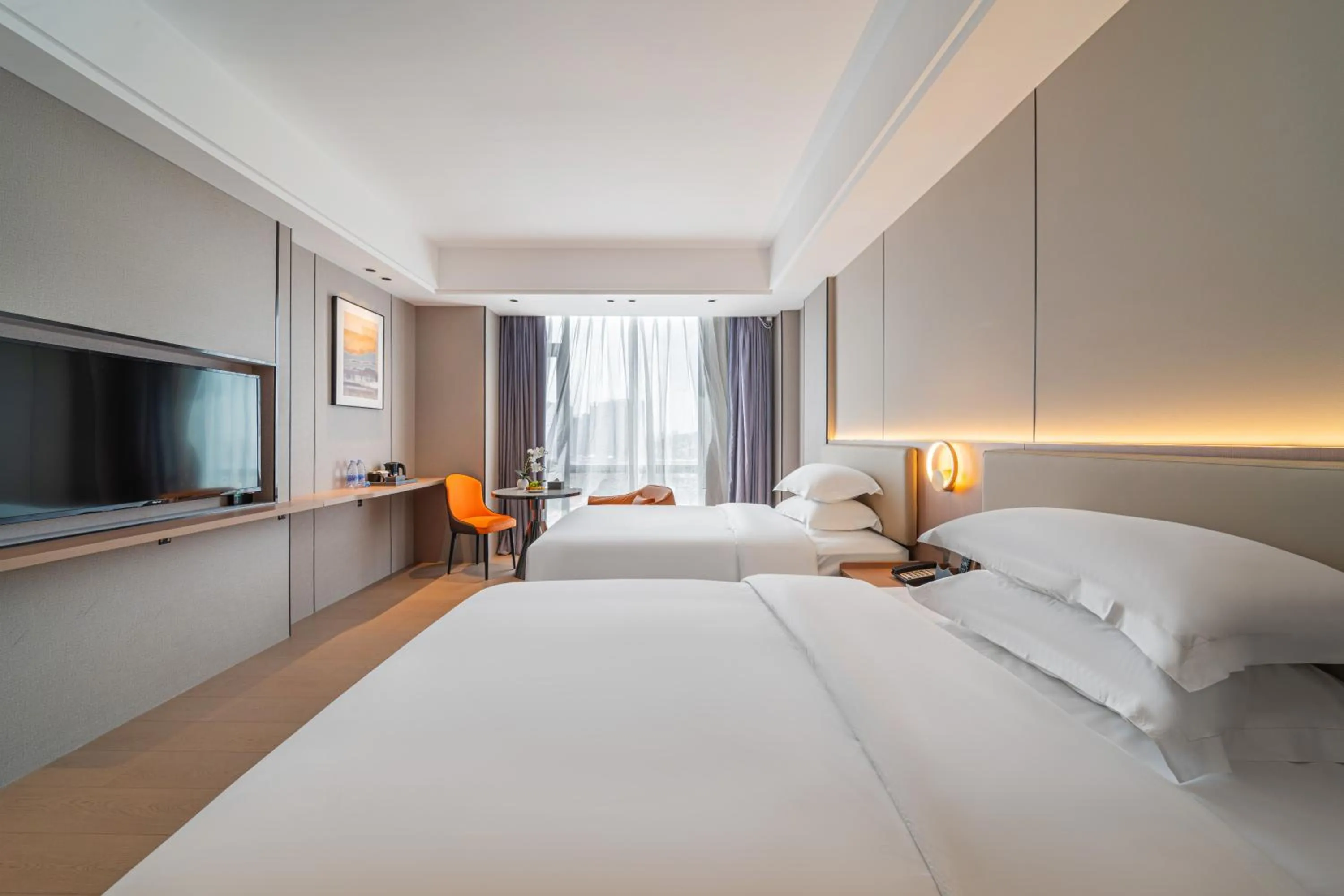 Communal lounge/ TV room, Bed in Poltton Century Hotel Yangjiang Jinshan Road