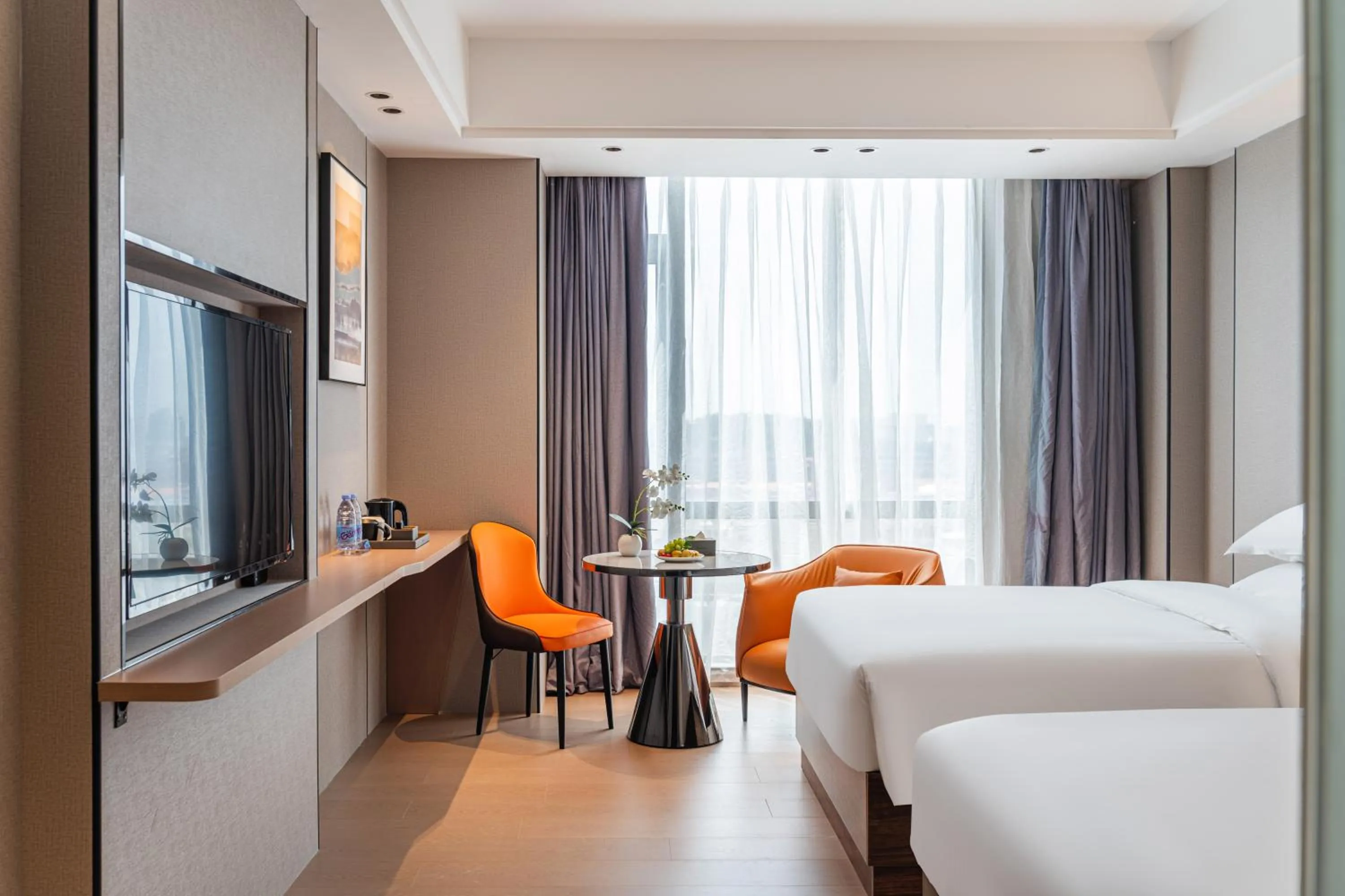 Communal lounge/ TV room, Bed in Poltton Century Hotel Yangjiang Jinshan Road