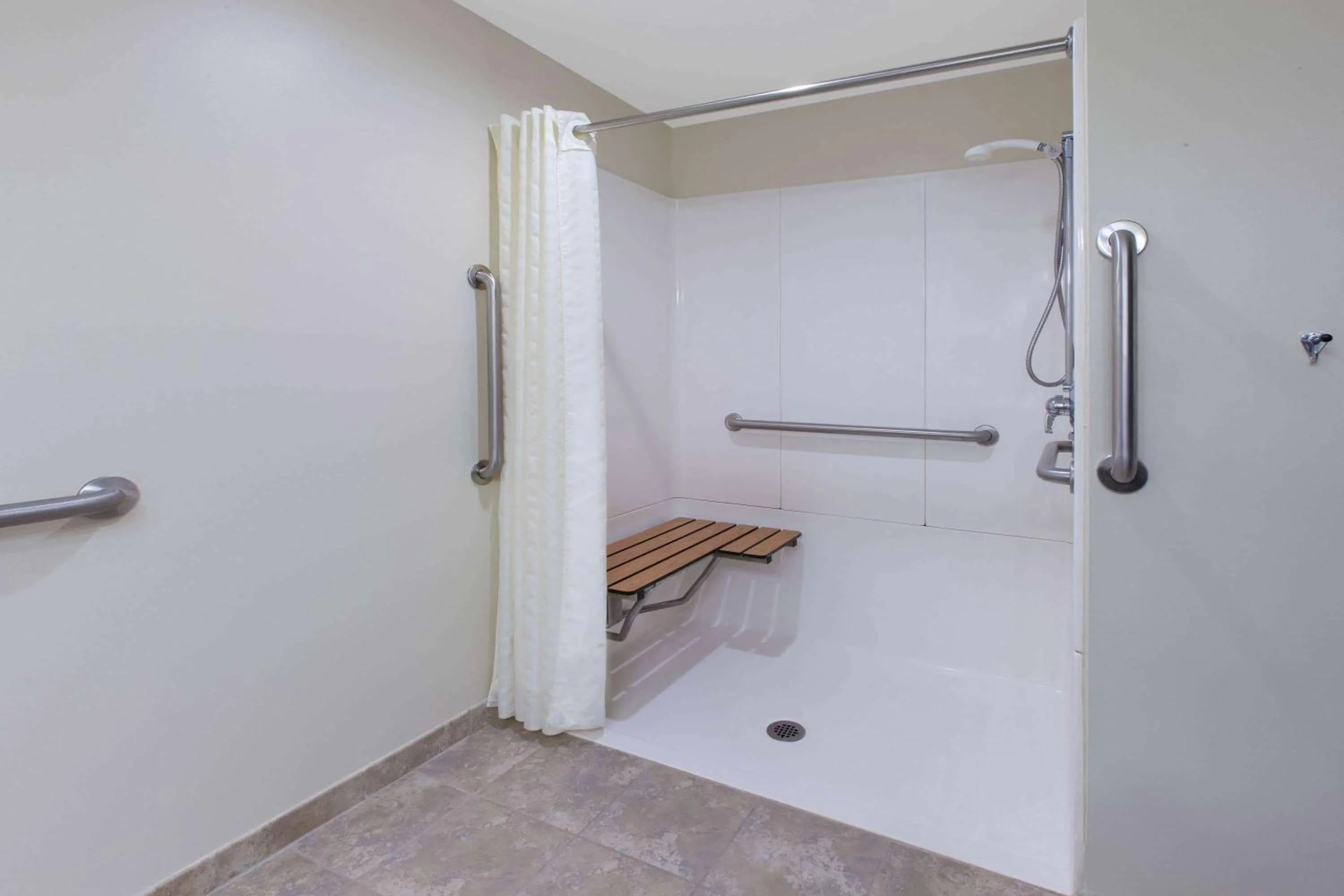 Shower in AmericInn by Wyndham Silver City
