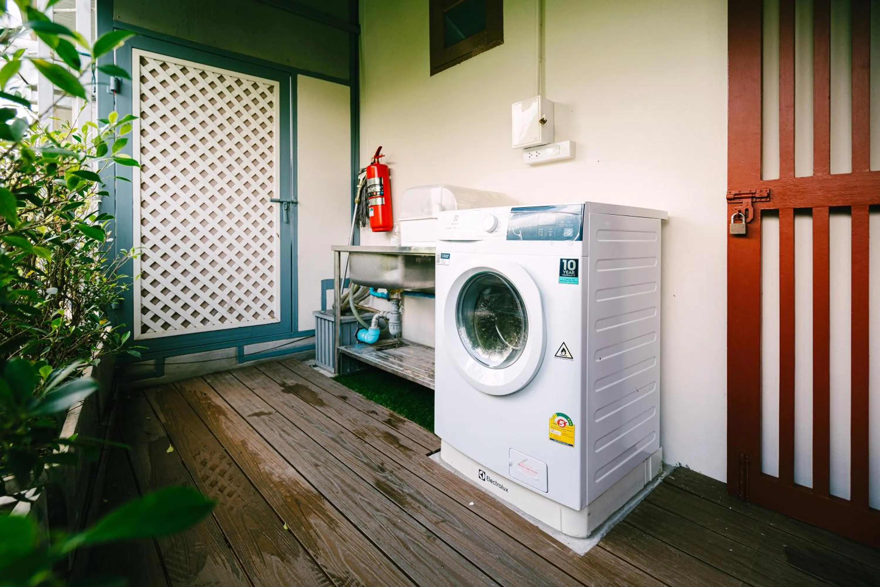washing machine in O'nya Phuket Hotel