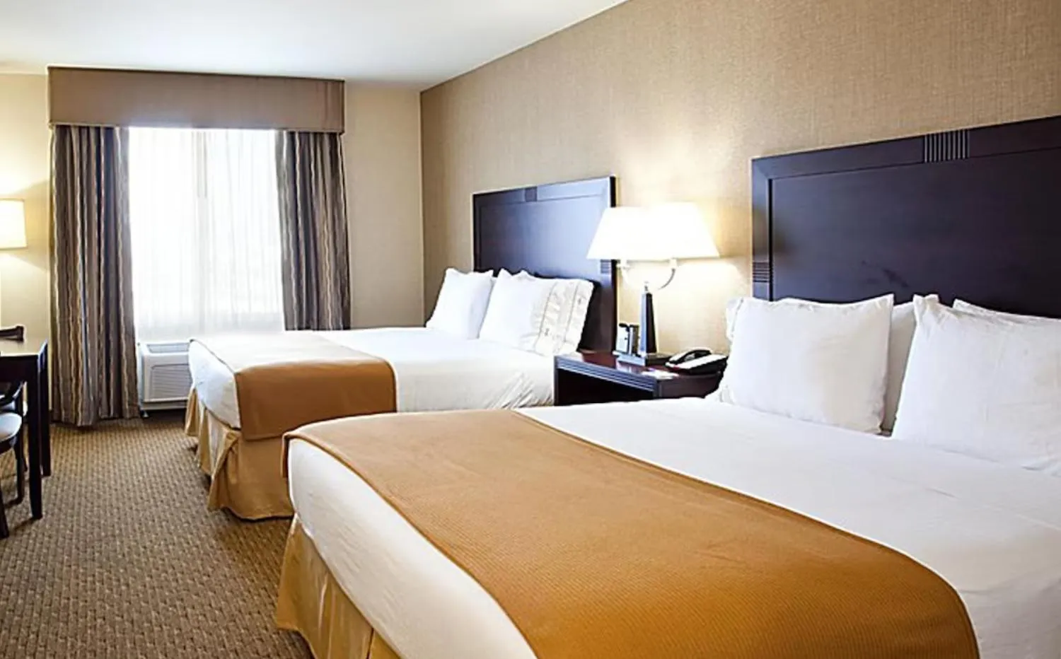 Bed in Blue Way Inn Eagan Extended Stay