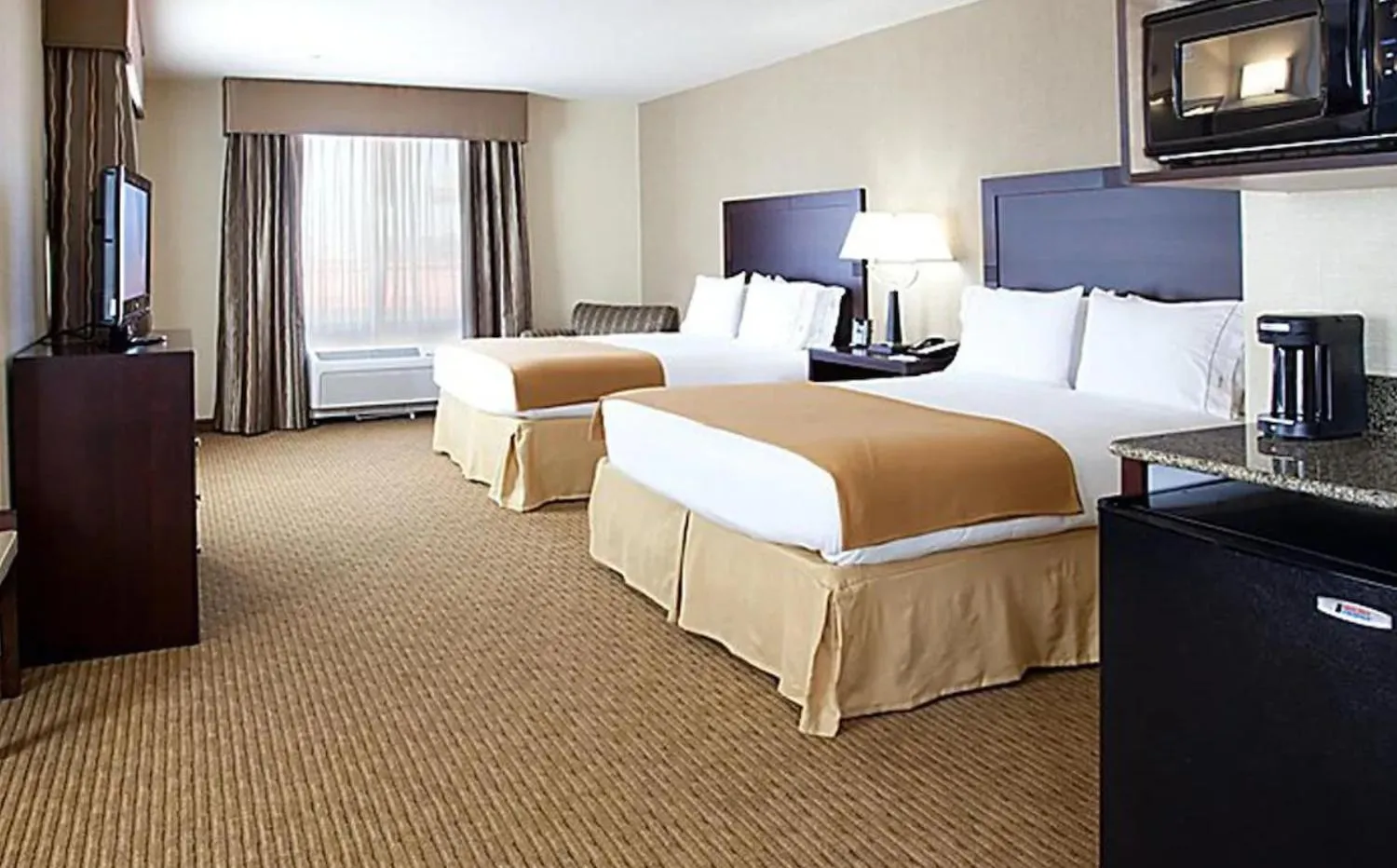 Bed in Blue Way Inn Eagan Extended Stay