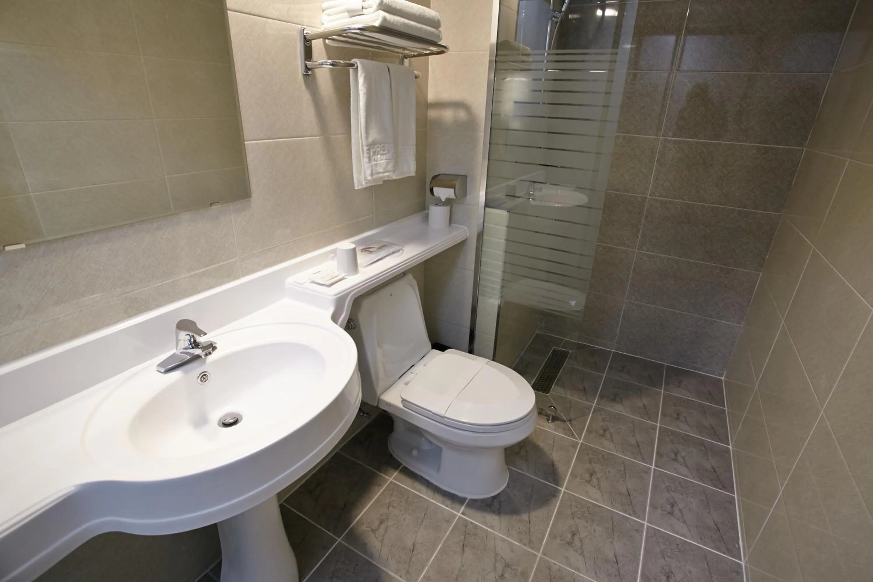 Bathroom in CS Premier Hotel