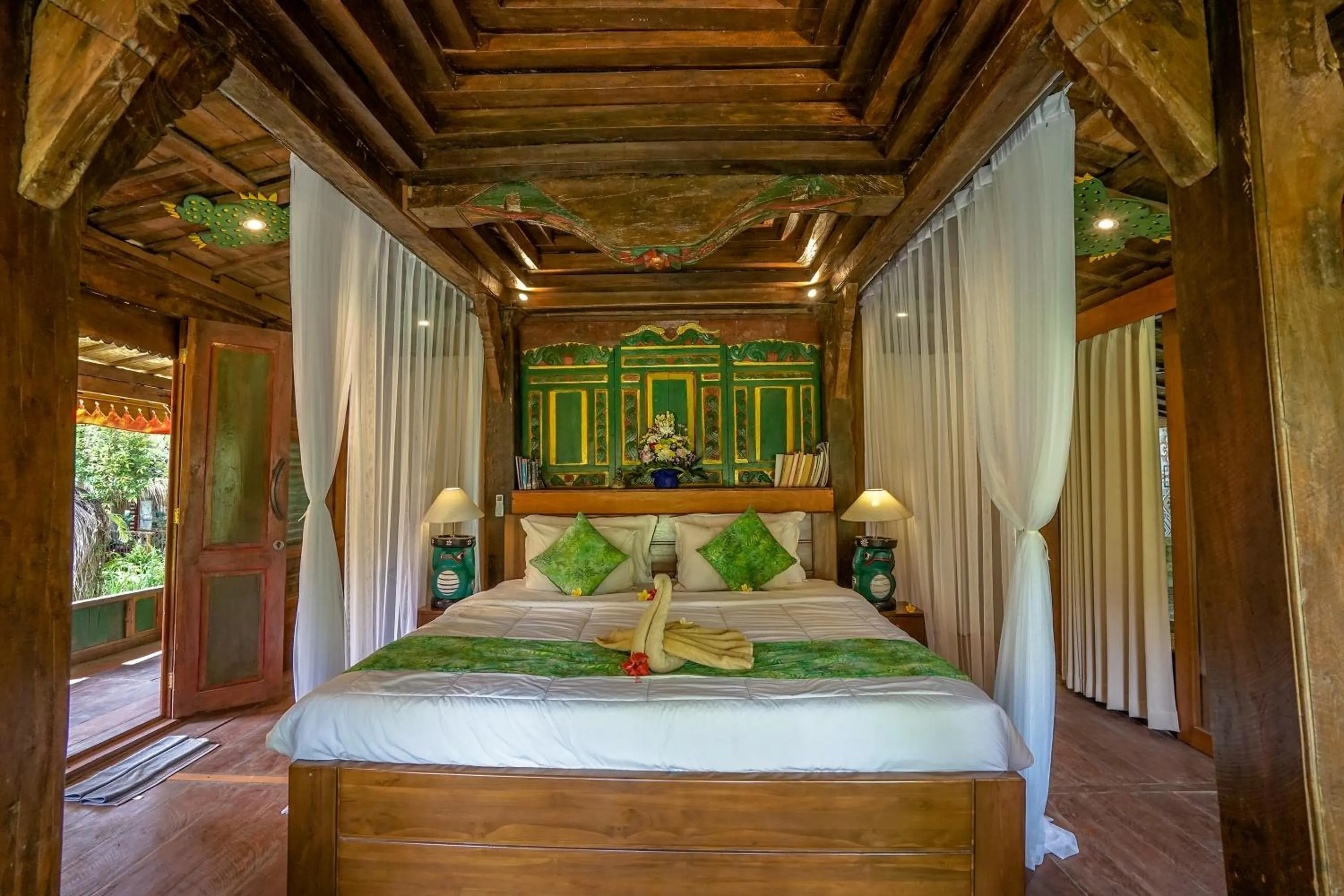 Bed in KTS Balinese Villas