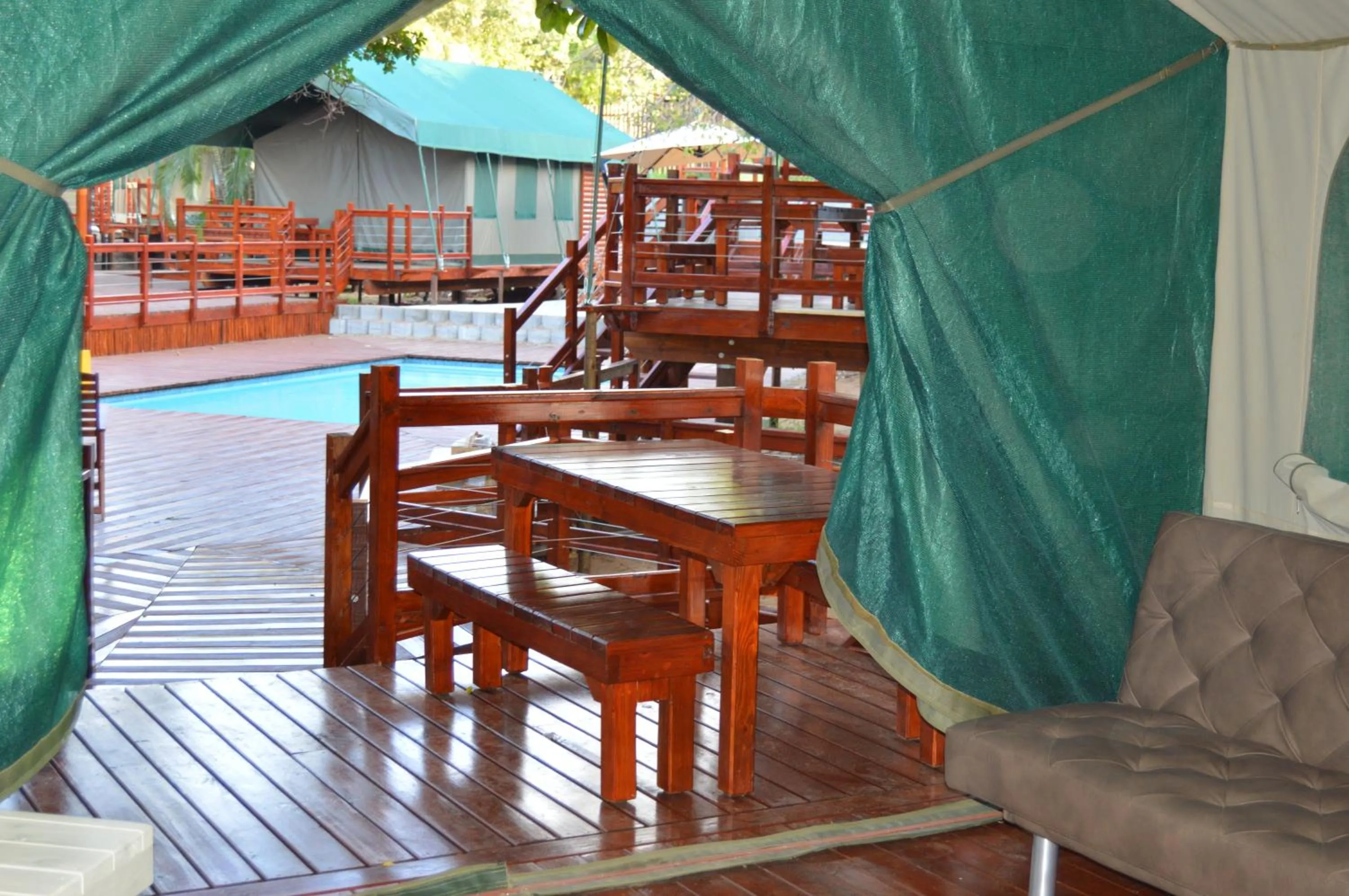 Bed in Luxury Tented Village @ Urban Glamping