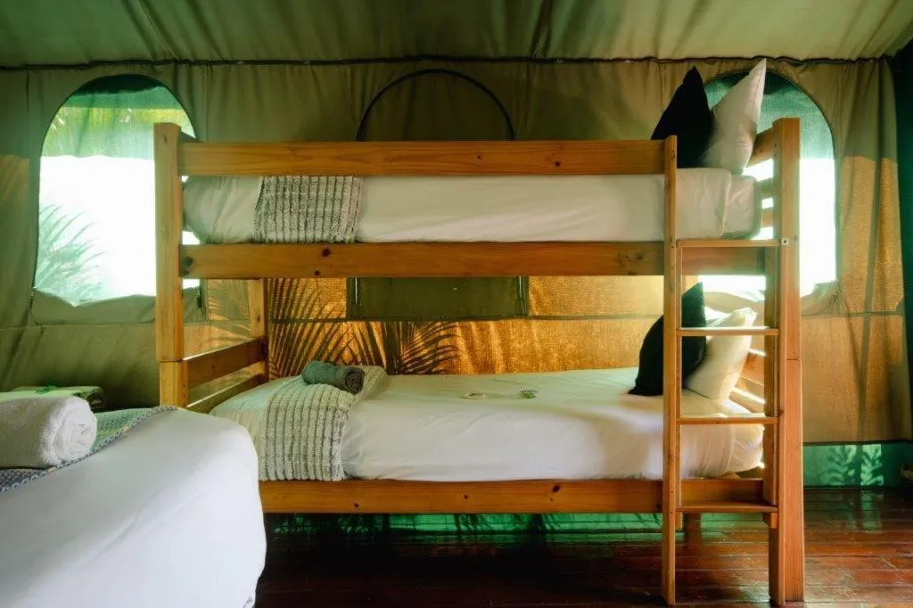 Bed in Luxury Tented Village @ Urban Glamping