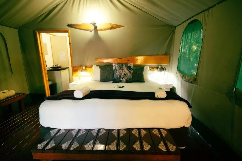 Bed in Luxury Tented Village @ Urban Glamping