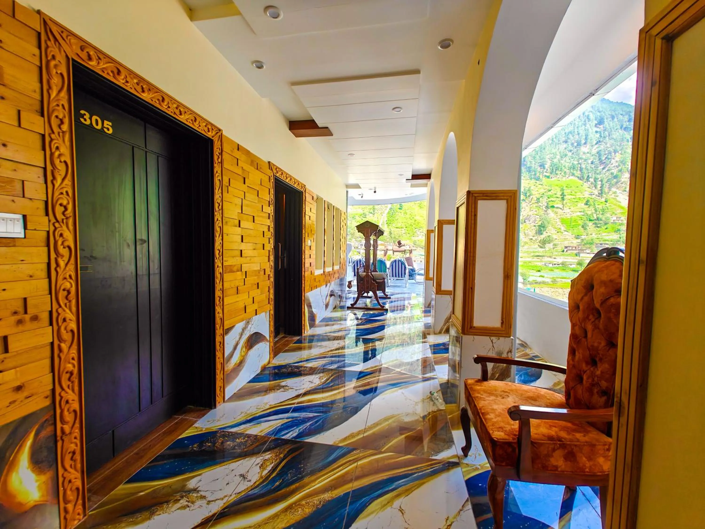 Seating area in Kabirs Hotel Kalam