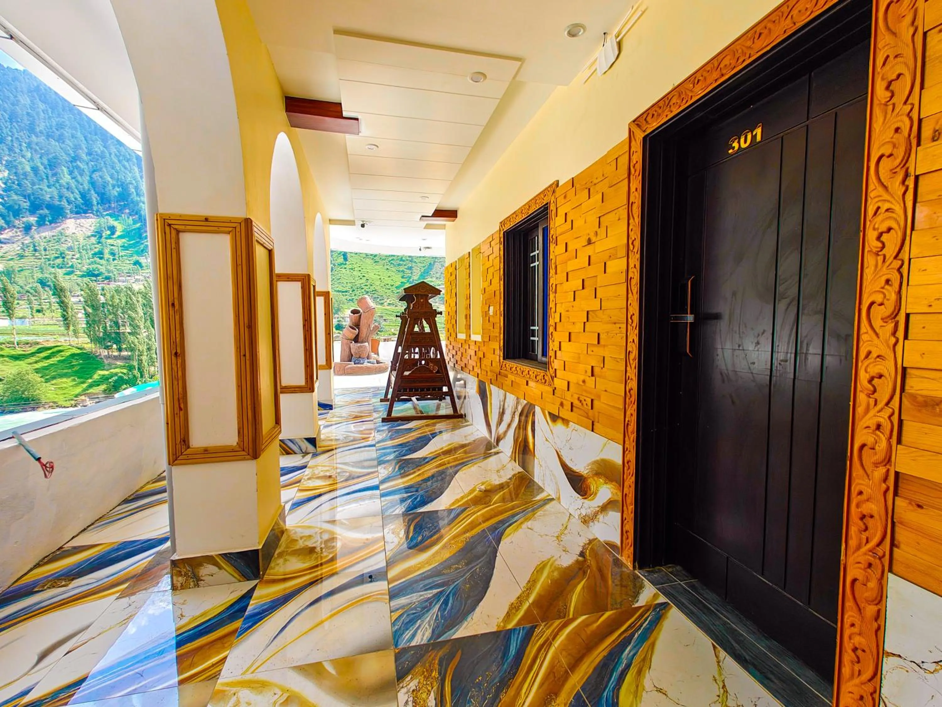 Seating area in Kabirs Hotel Kalam