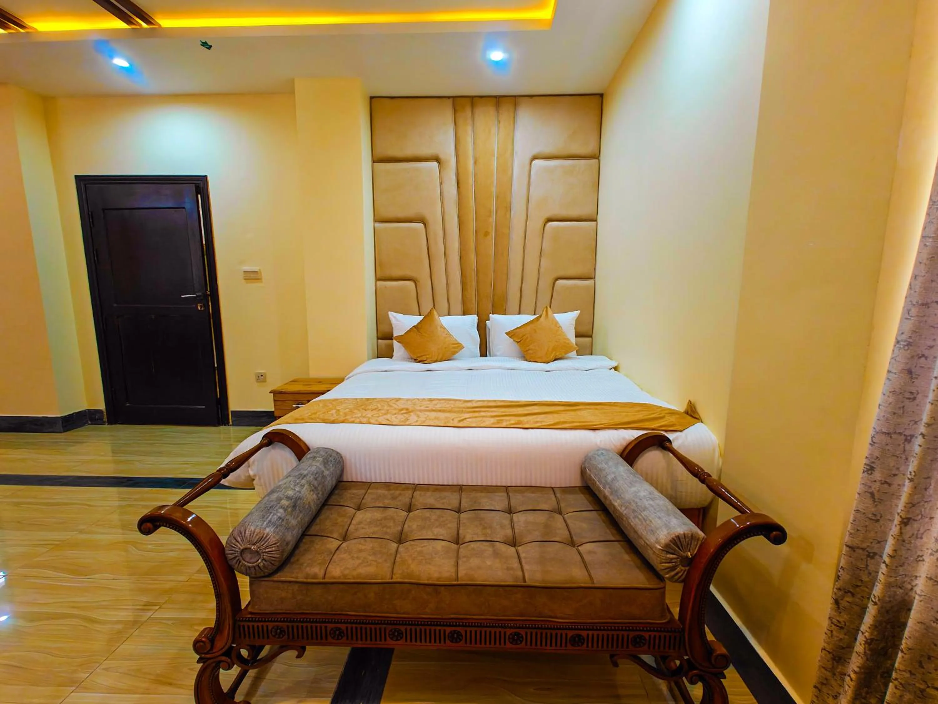Bed in Kabirs Hotel Kalam