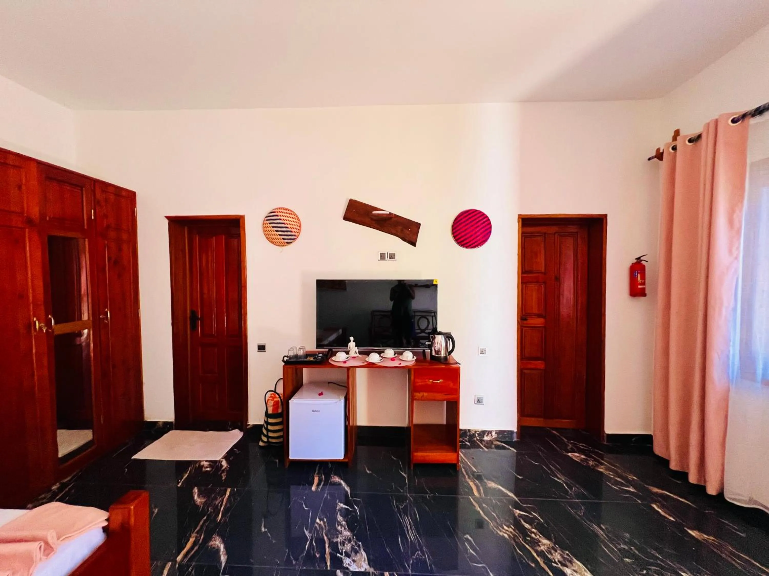 Communal lounge/ TV room in Tropical Nungwi