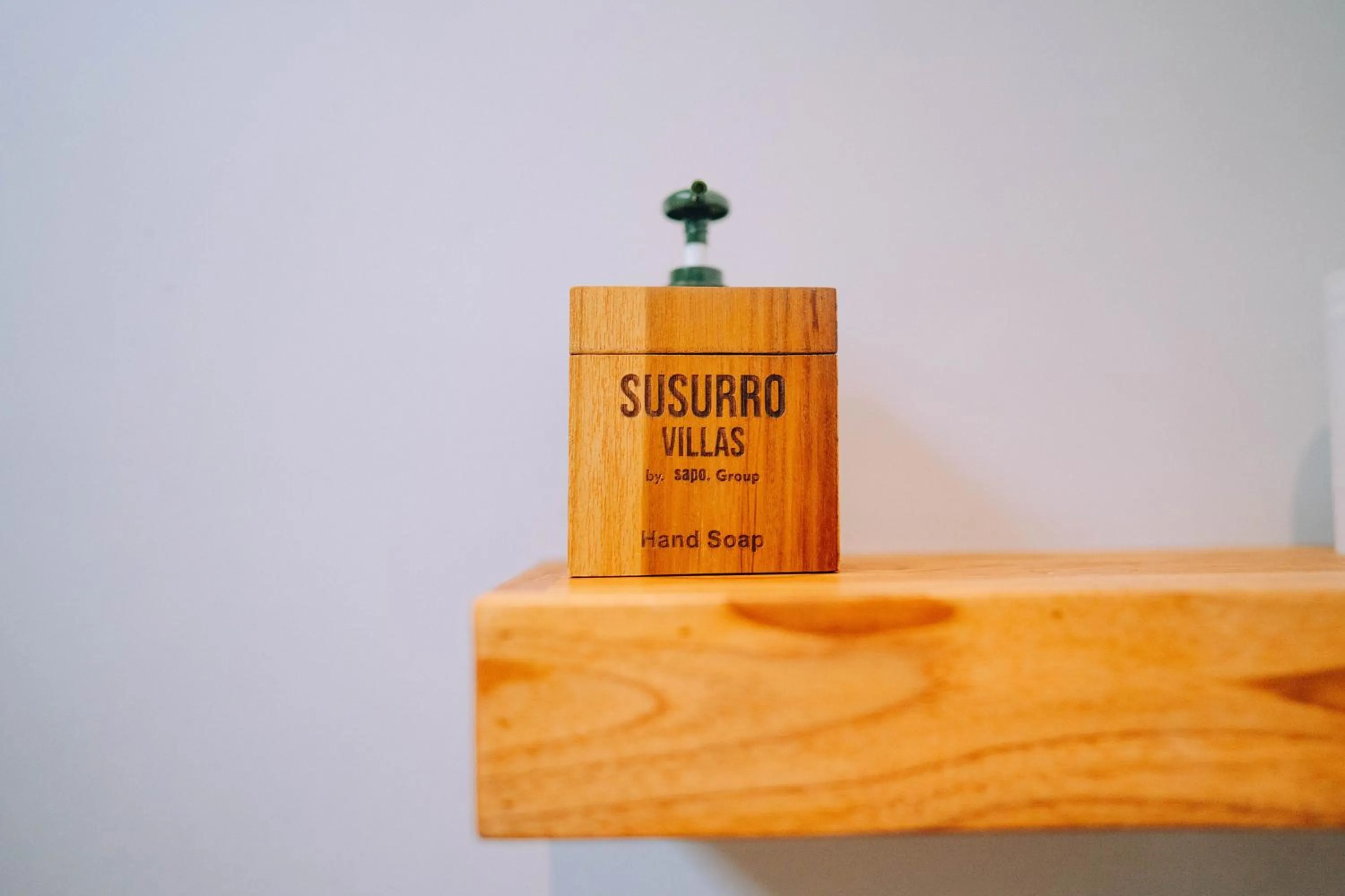 Property logo or sign in Susurro Villas - New Cozy Bungalow - Private Kitchen - Free Gym Access - 80Mbps WiFi