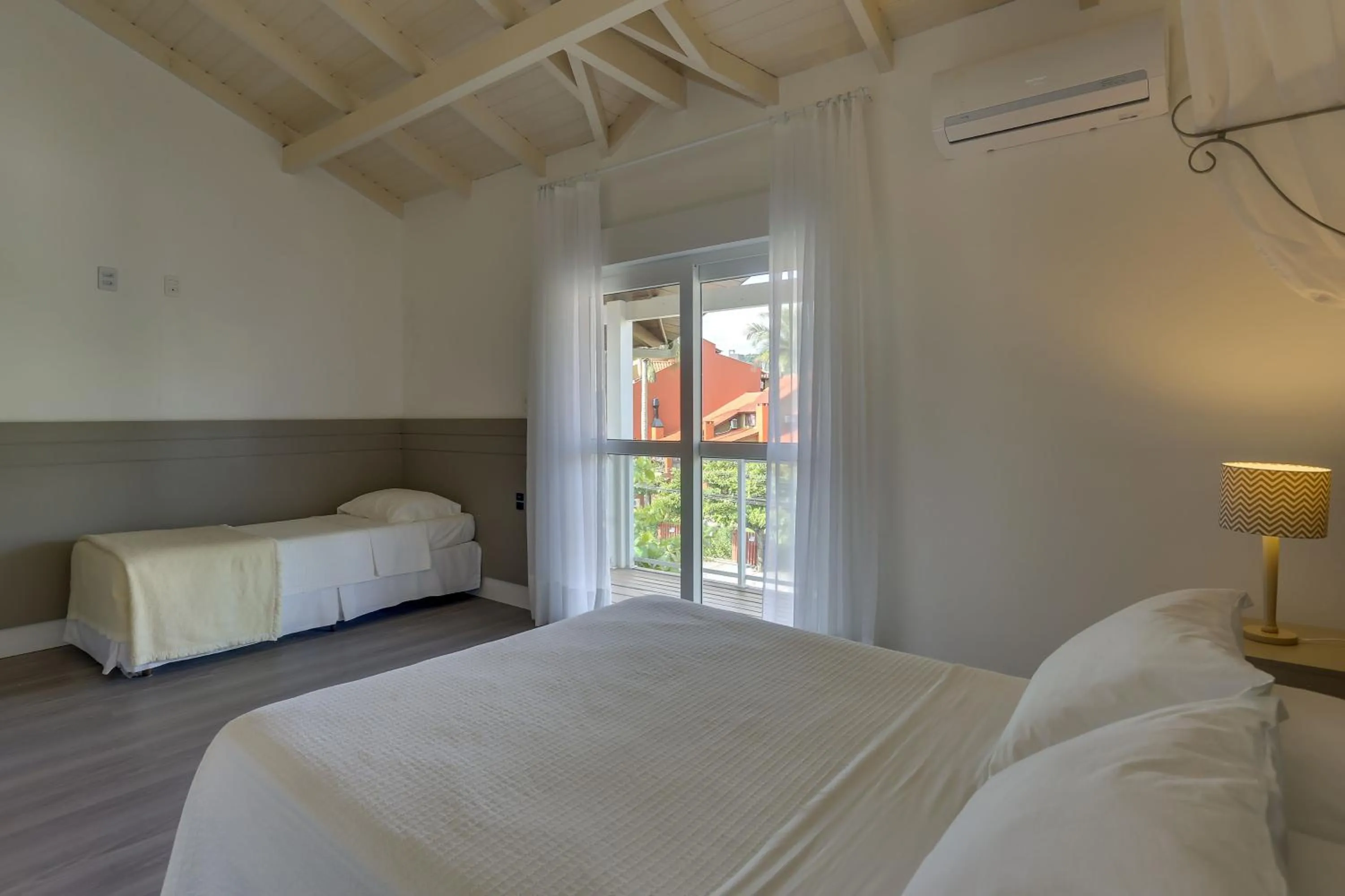 Bedroom, Bed in Villas Jurerê Residences