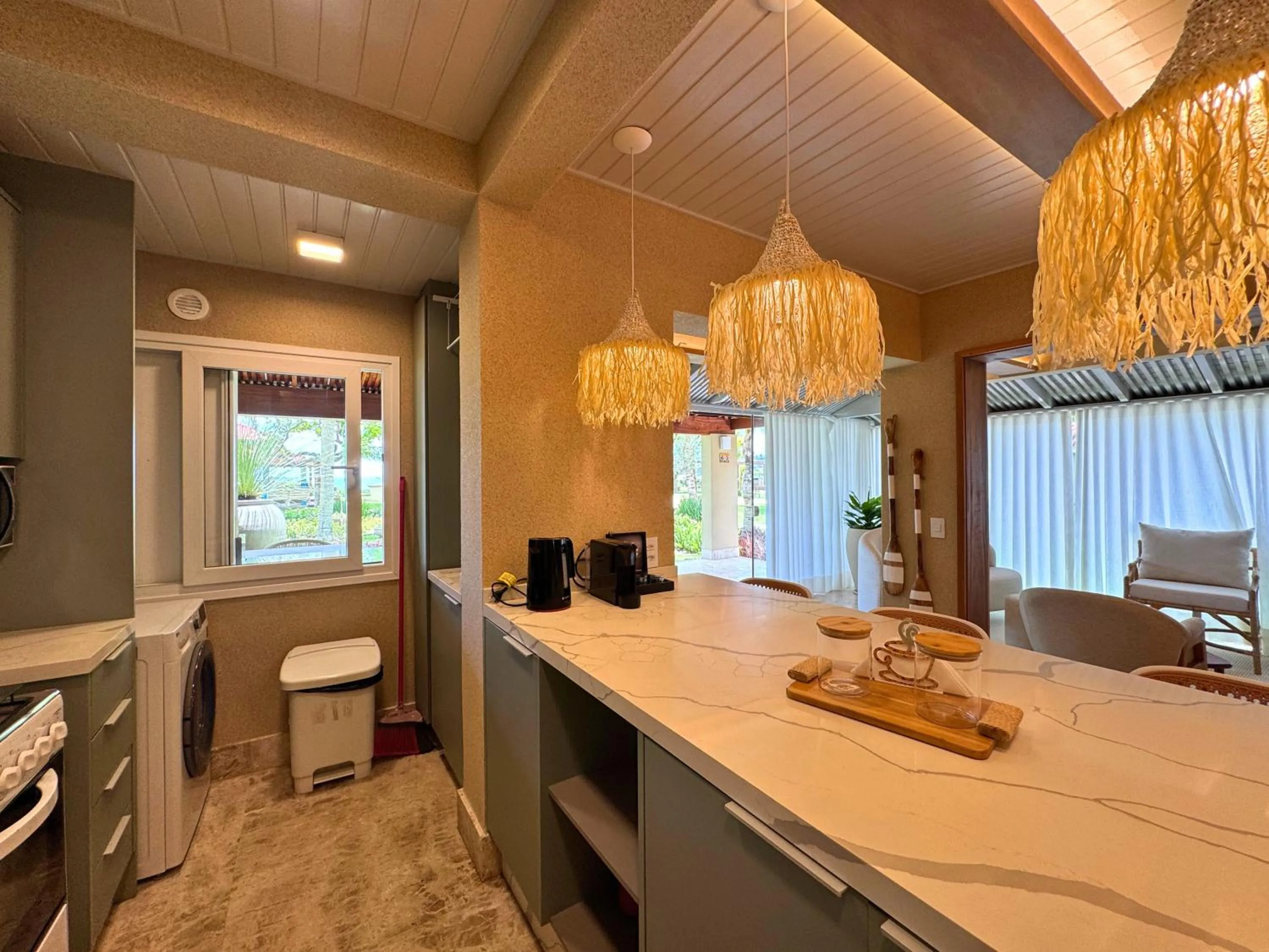 Kitchen or kitchenette in Villas Jurerê Residences