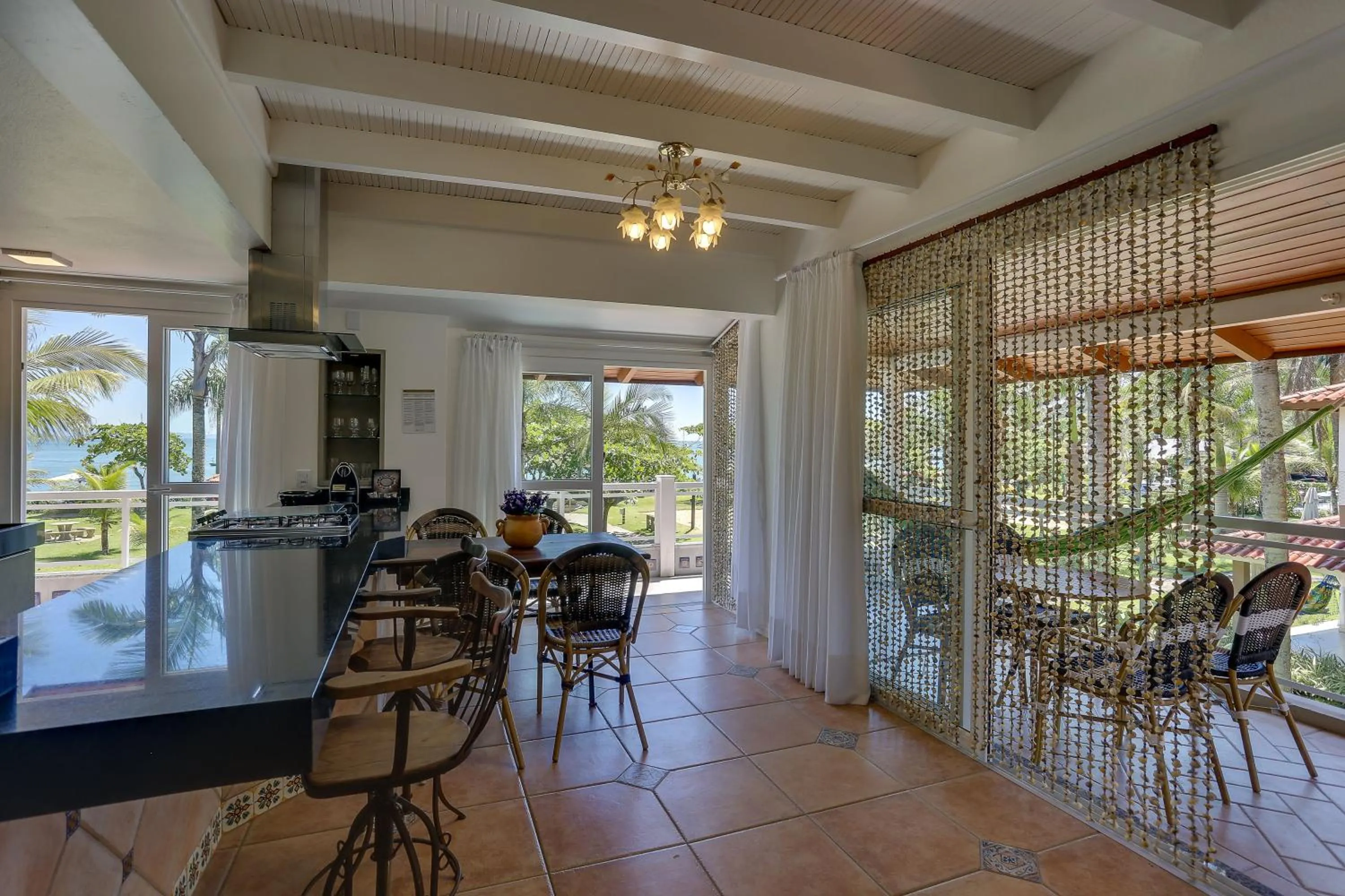 Kitchen or kitchenette in Villas Jurerê Residences