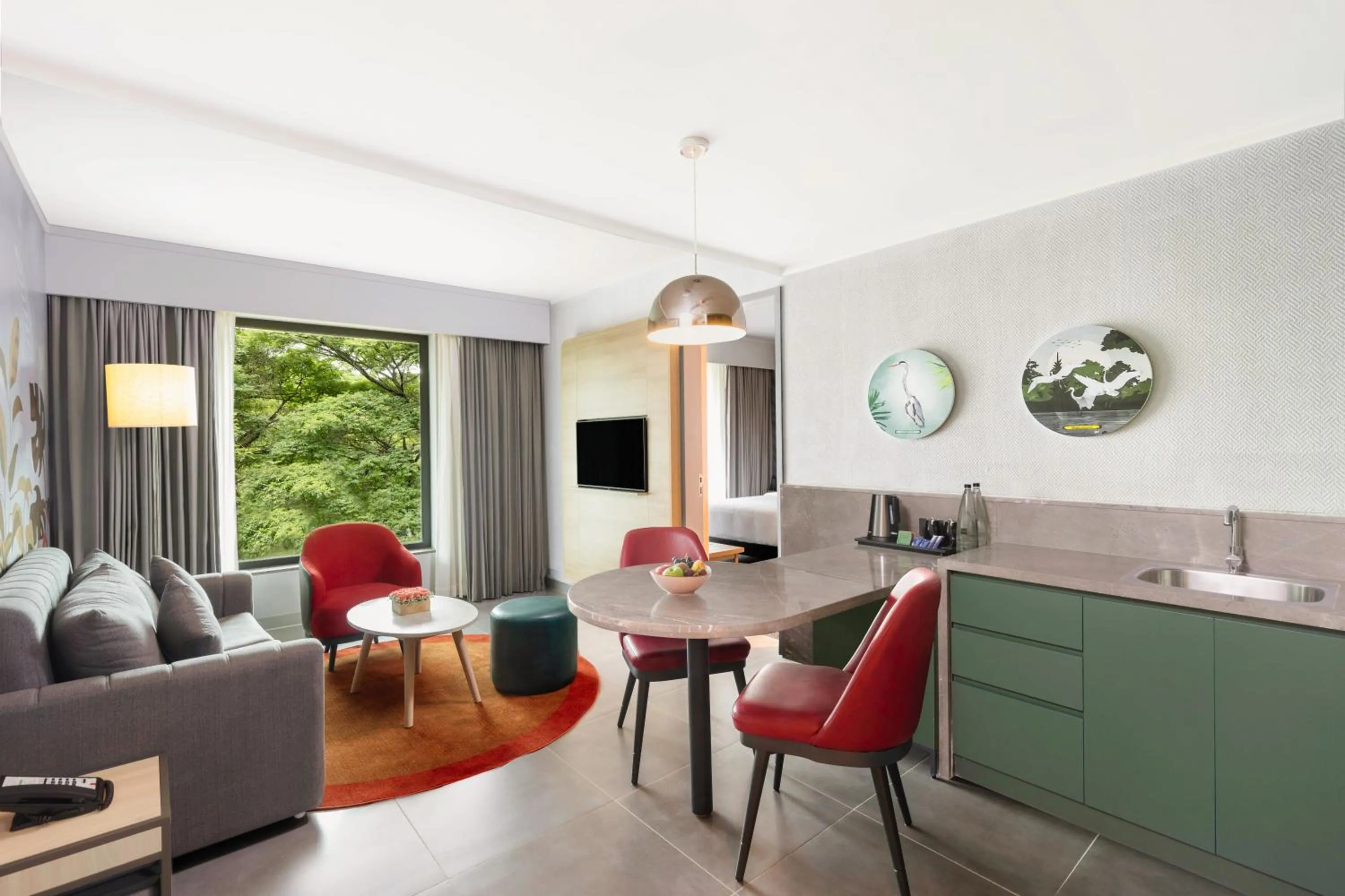 Living room in ibis Styles Mysuru