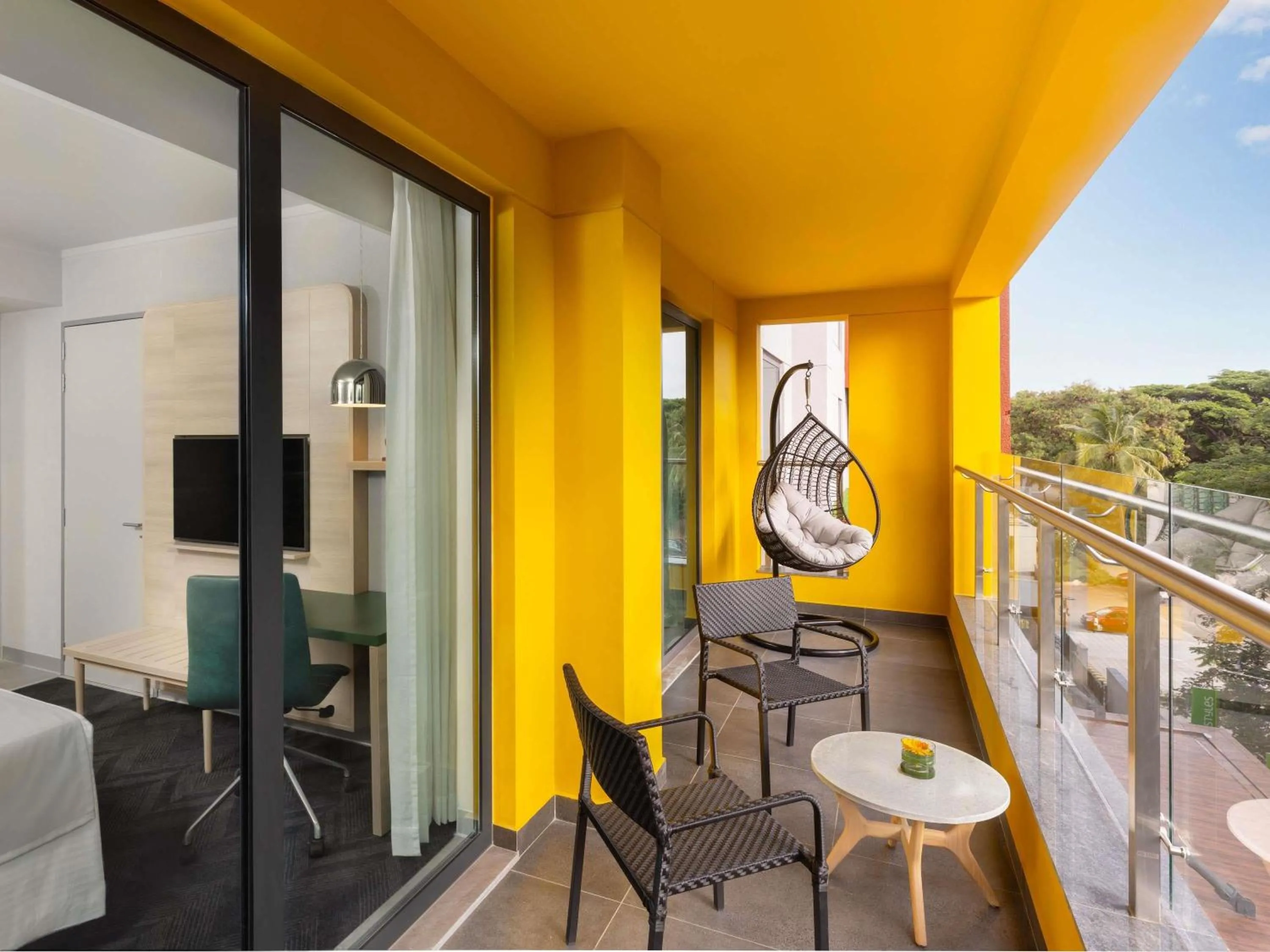 Bedroom in ibis Styles Mysuru