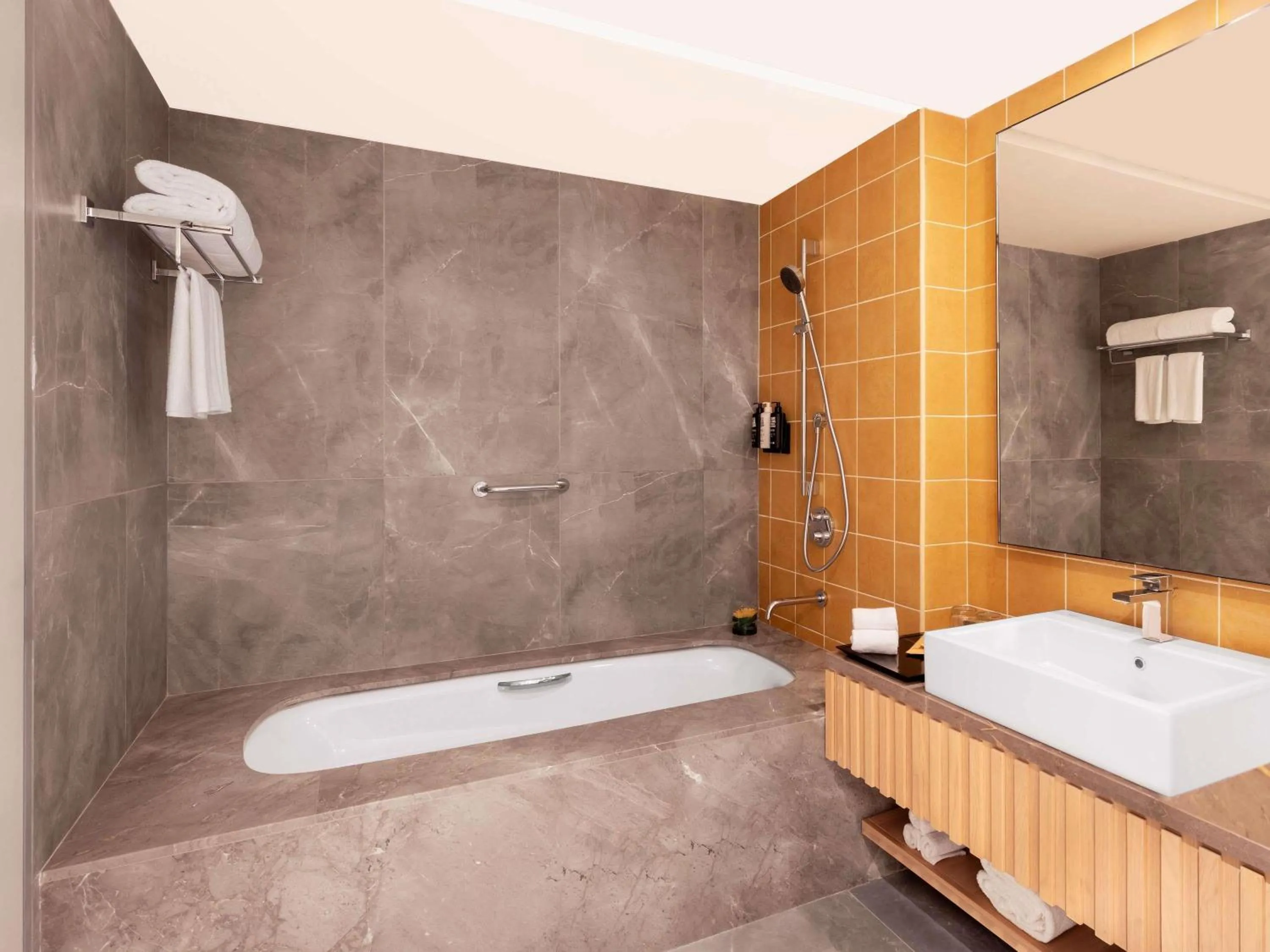 Bedroom in ibis Styles Mysuru