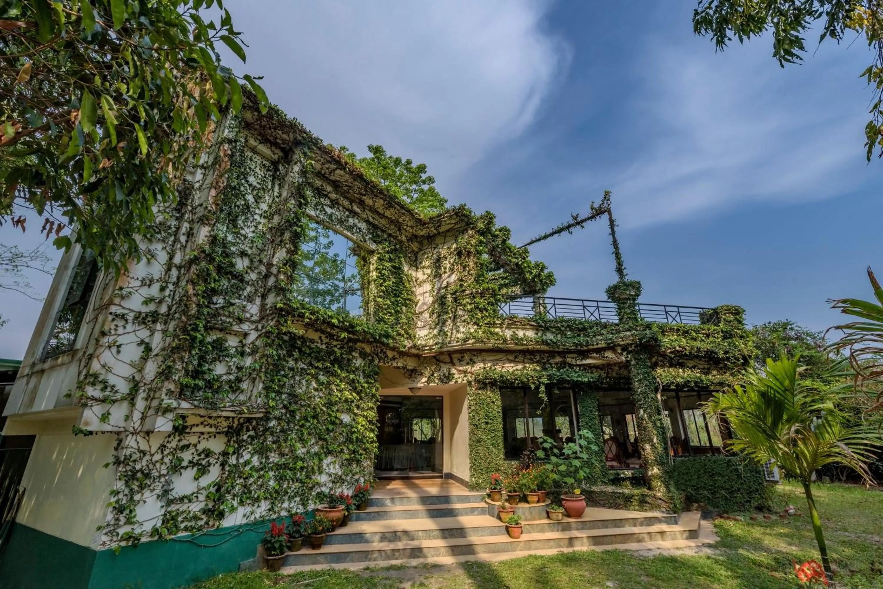 Property building in The Riverwood Forest Retreat Dooars - fully vaccinated staff