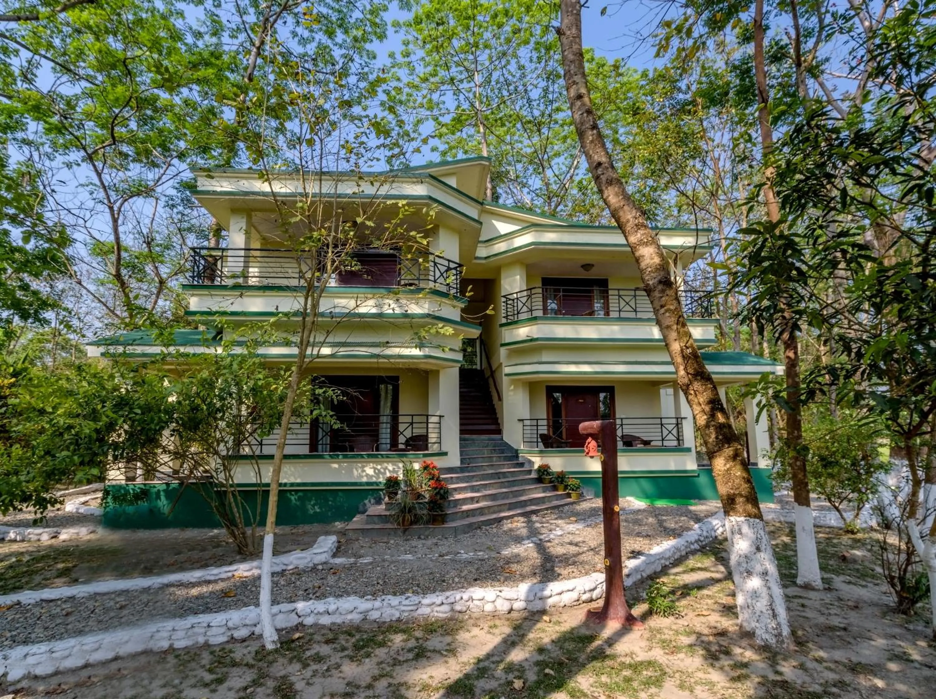 Property building in The Riverwood Forest Retreat Dooars - fully vaccinated staff