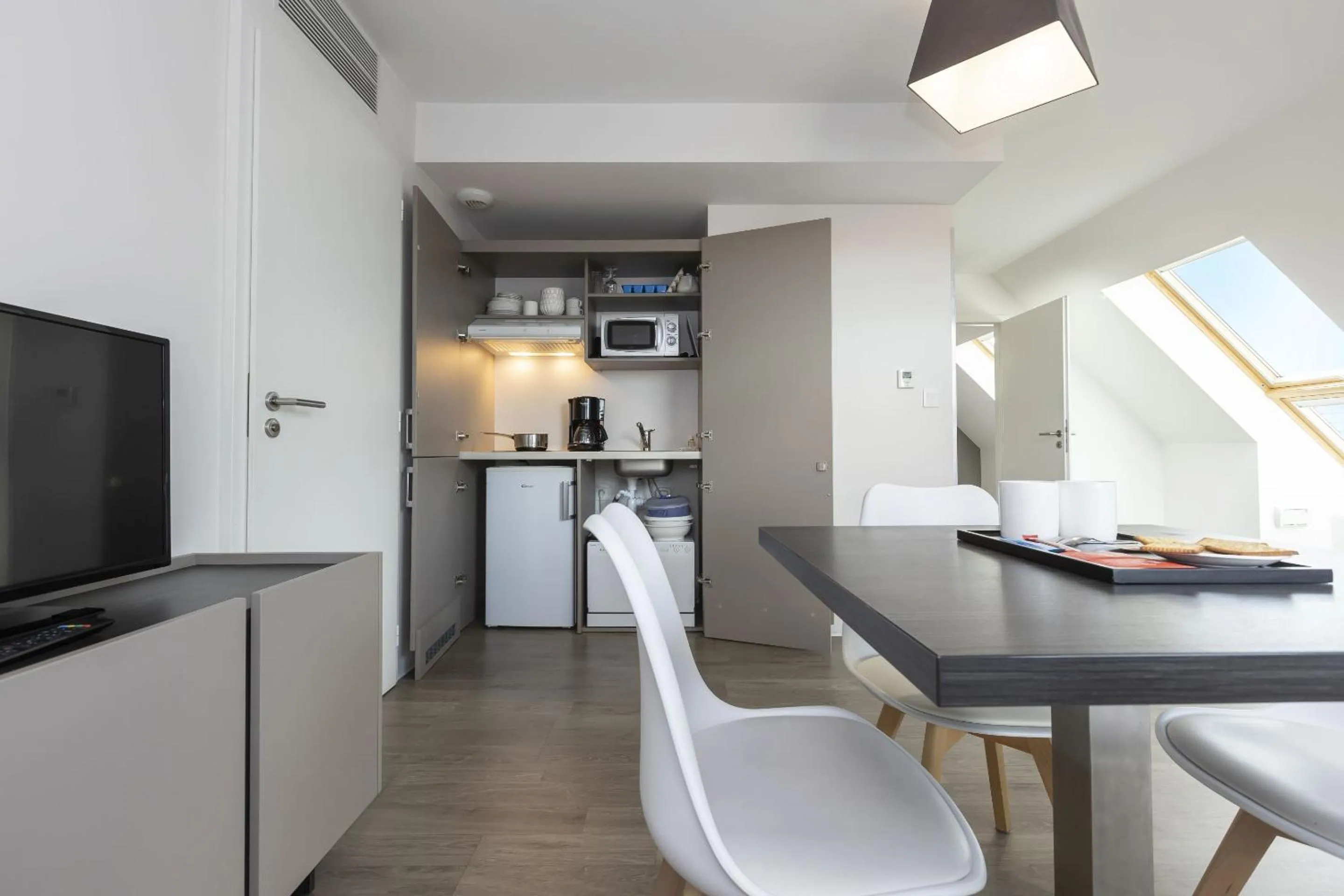 Kitchen or kitchenette in Appart Hotel Odalys City Colmar La Rose d'Argent