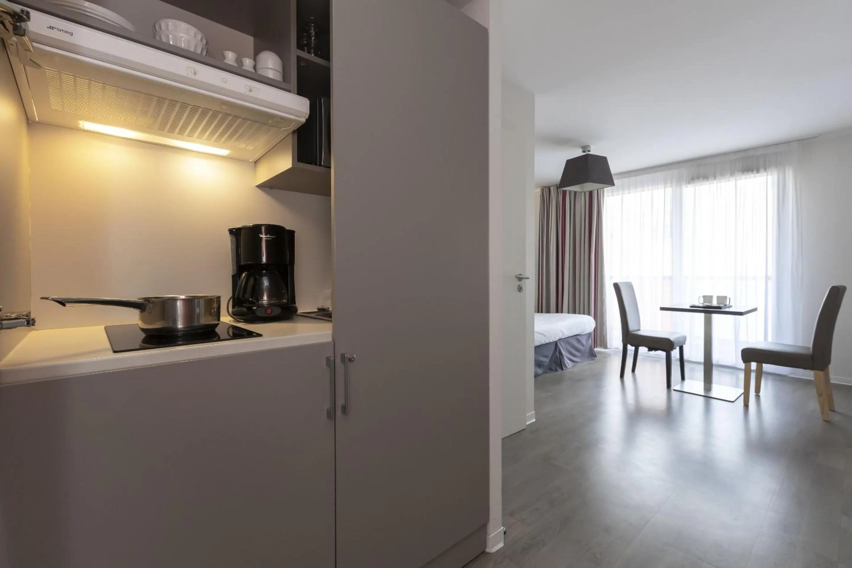 Kitchen or kitchenette in Appart Hotel Odalys City Colmar La Rose d'Argent