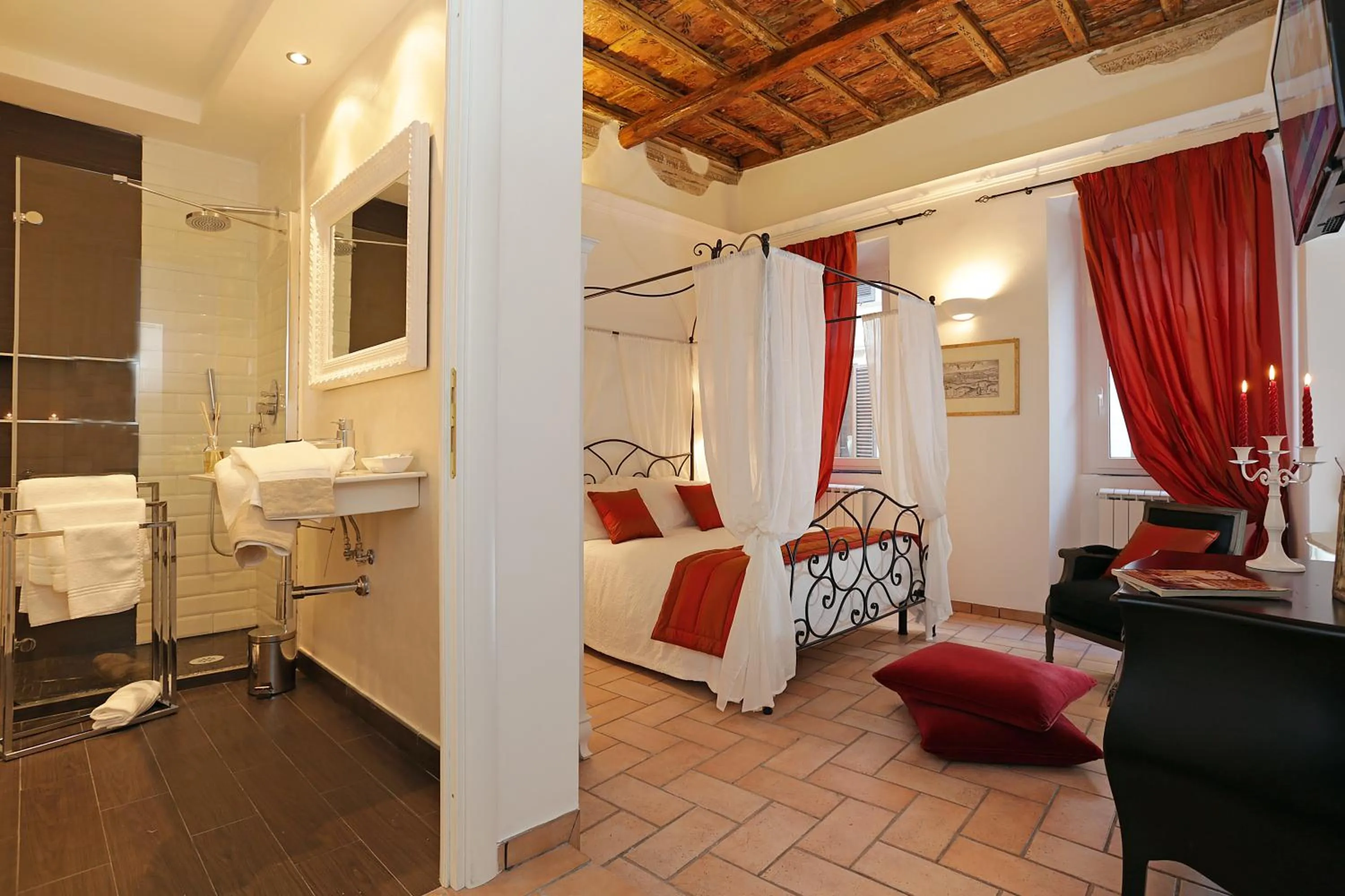 Bedroom in Madonna de' Monti Suites