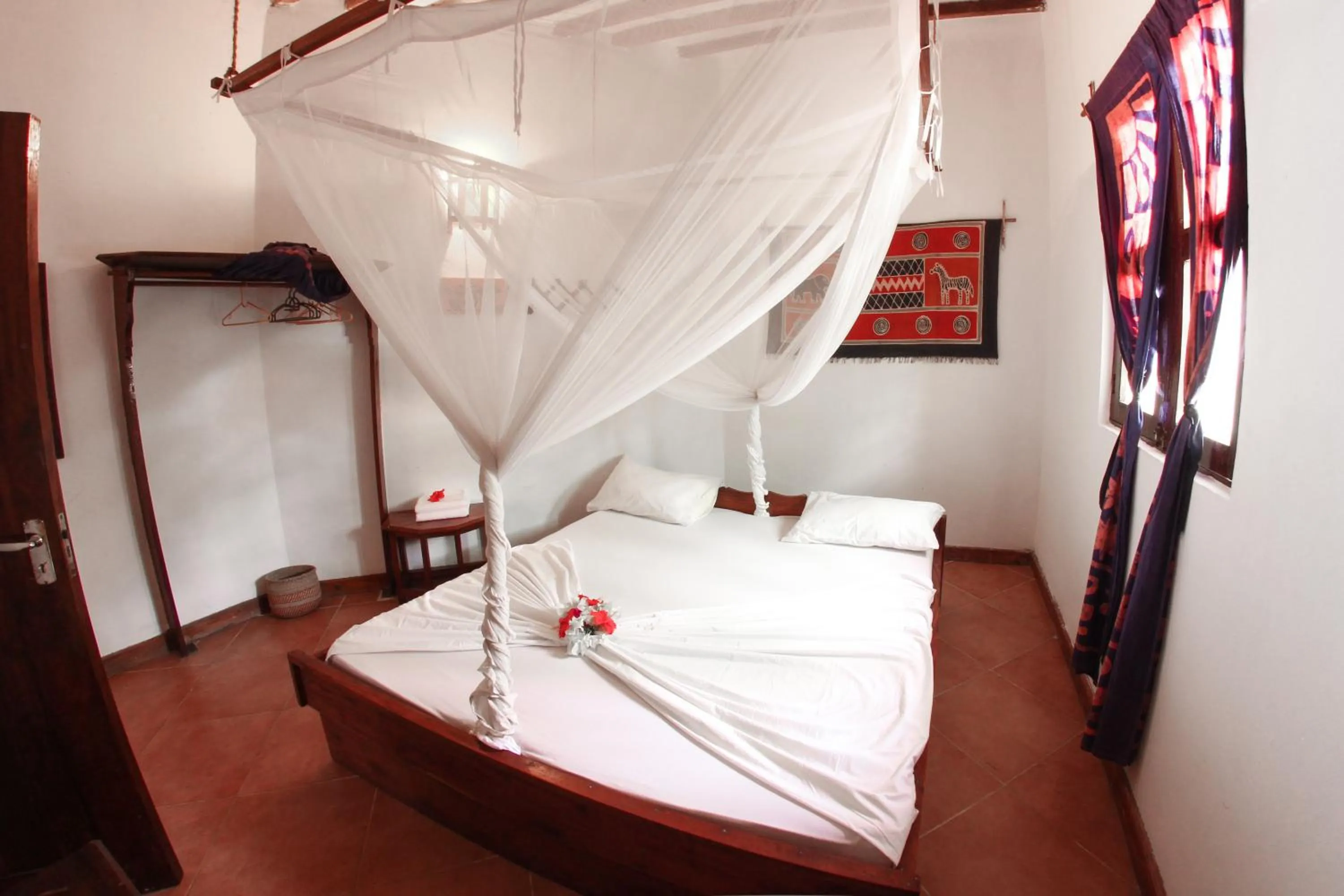 Bedroom, Bed in Kipepeo Lodge Zanzibar
