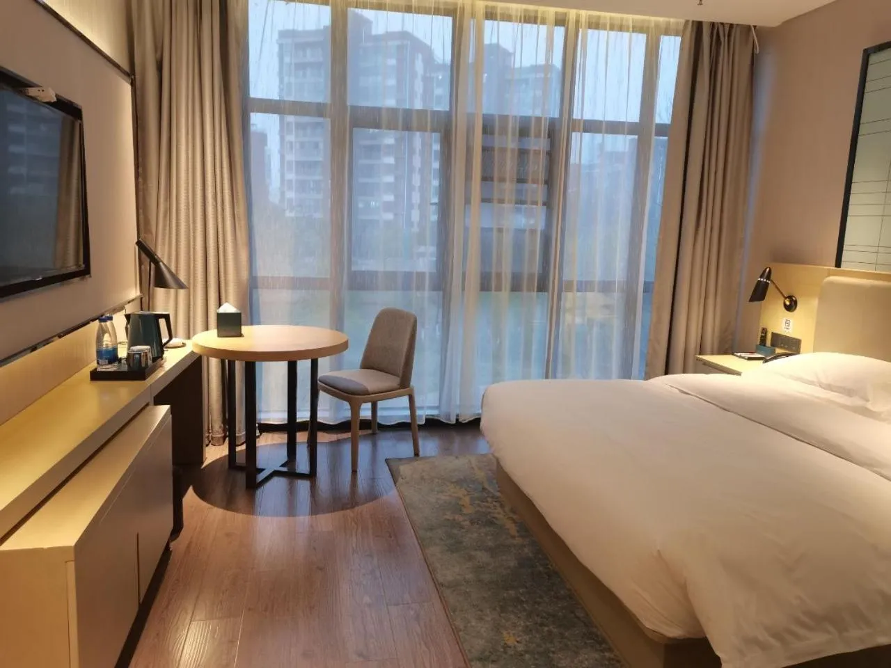 Photo of the whole room, Bed in Echarm Hotel Fengcheng Fengshui Lake