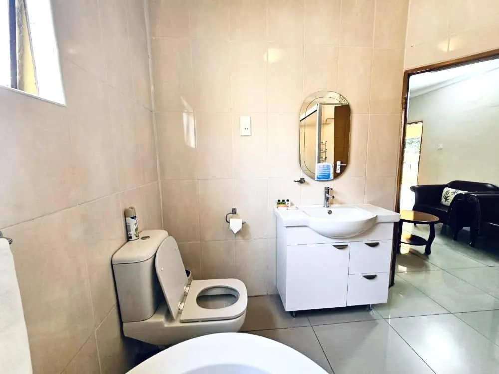 Toilet in Maun Executive Inn