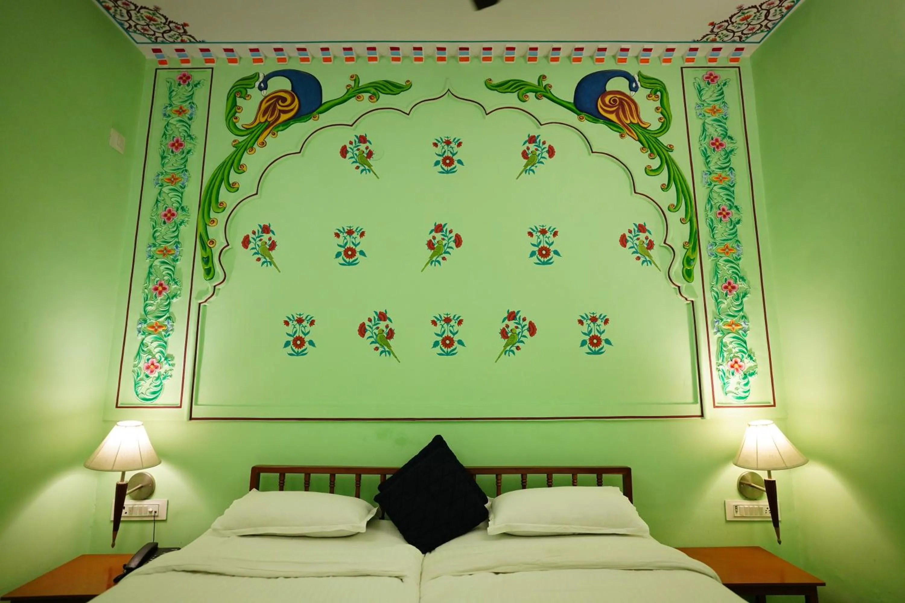 Bed in Haveli Kalwara - A Heritage Hotel