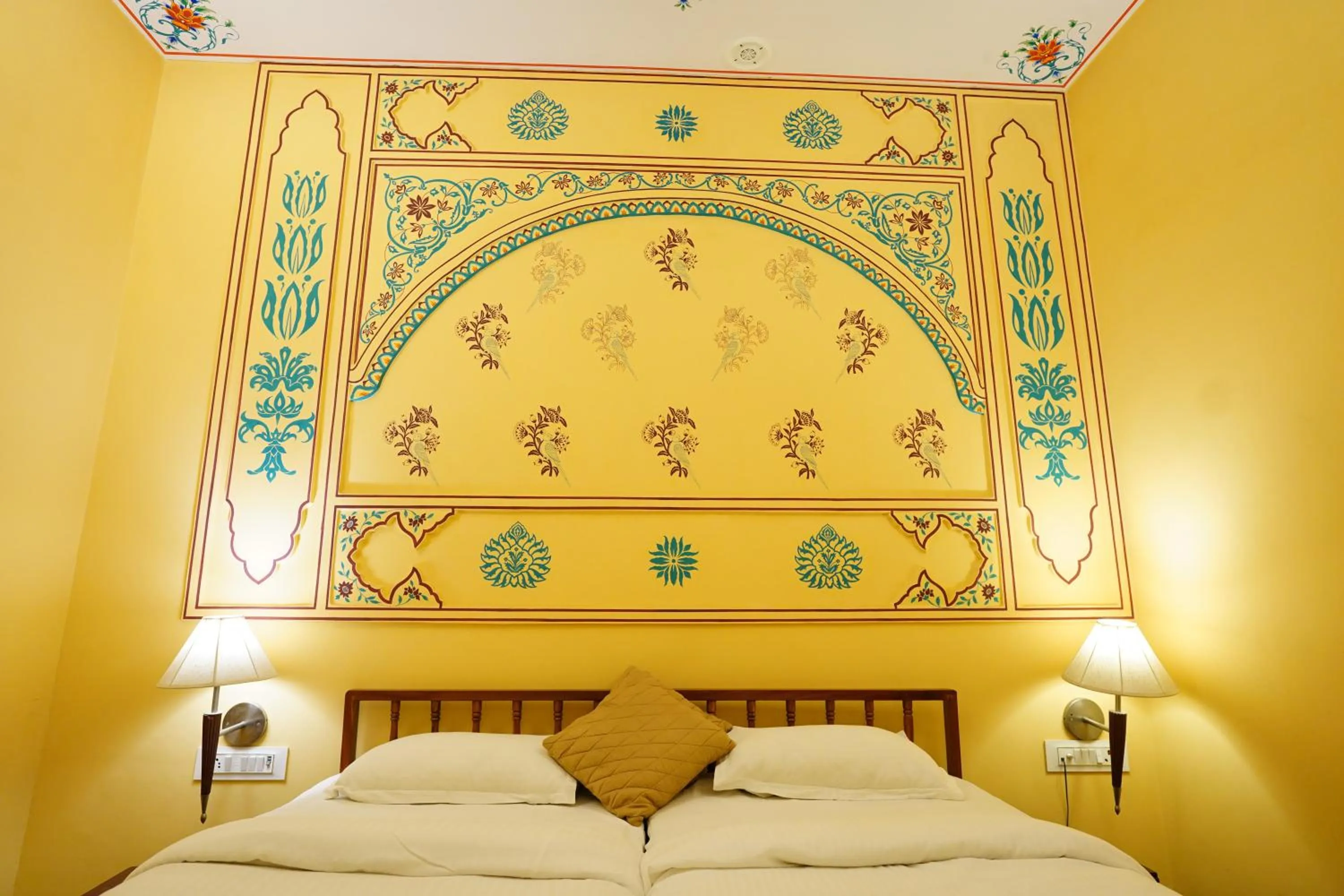 Bed in Haveli Kalwara - A Heritage Hotel