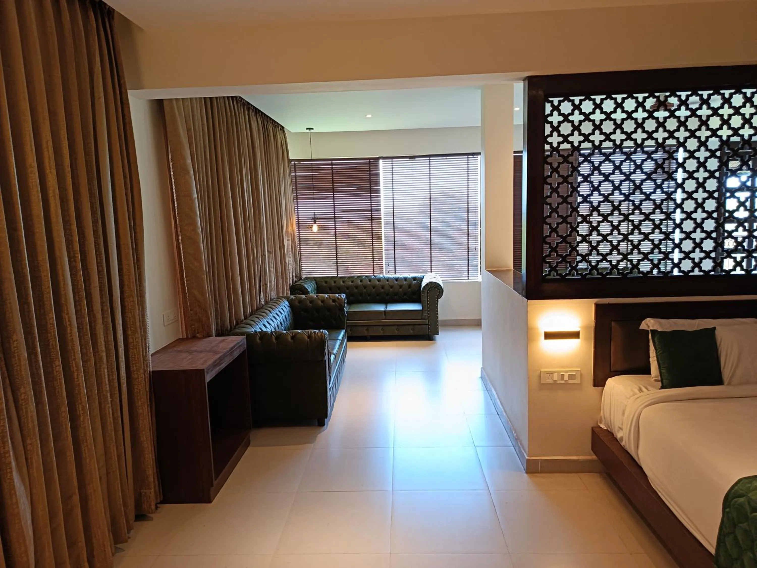 Bed in Hotel Rameswaram Grand