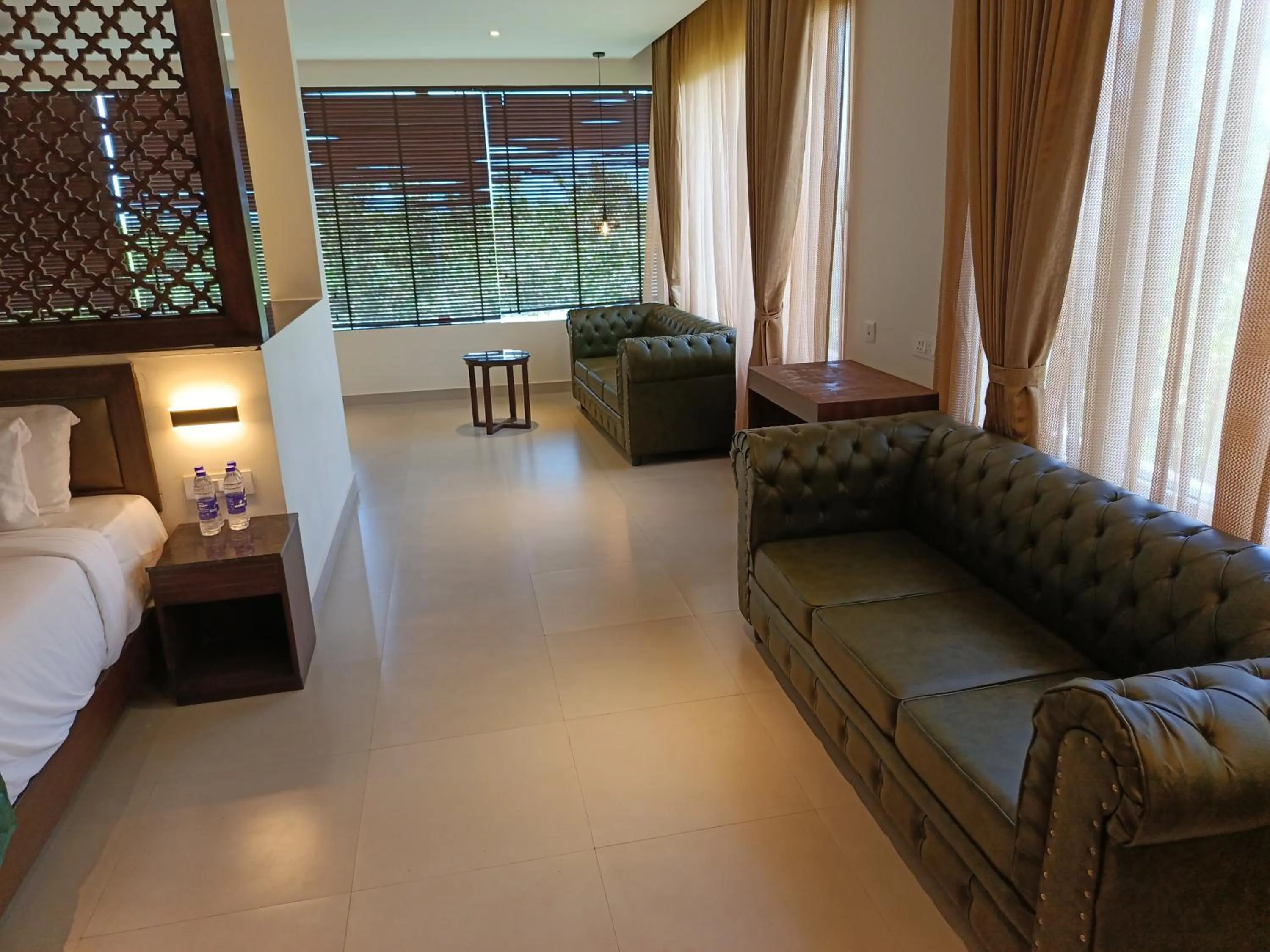 Bed in Hotel Rameswaram Grand