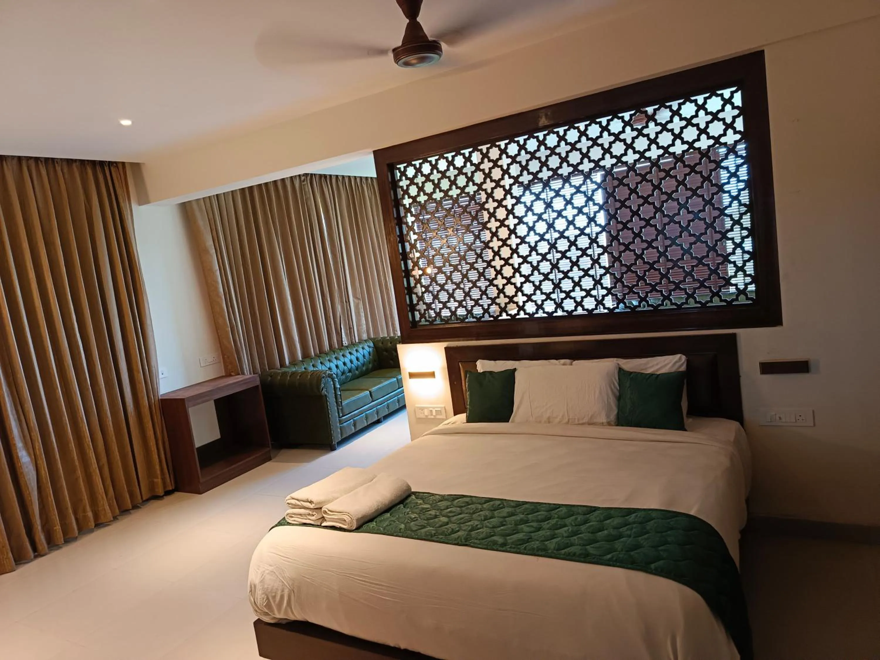 Bed in Hotel Rameswaram Grand